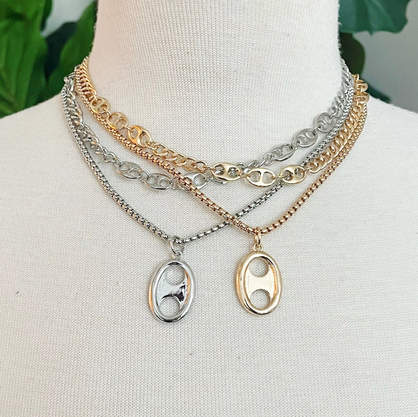 Button Charm Golden Necklace Set featuring two elegant necklaces with adjustable lengths and chic design.