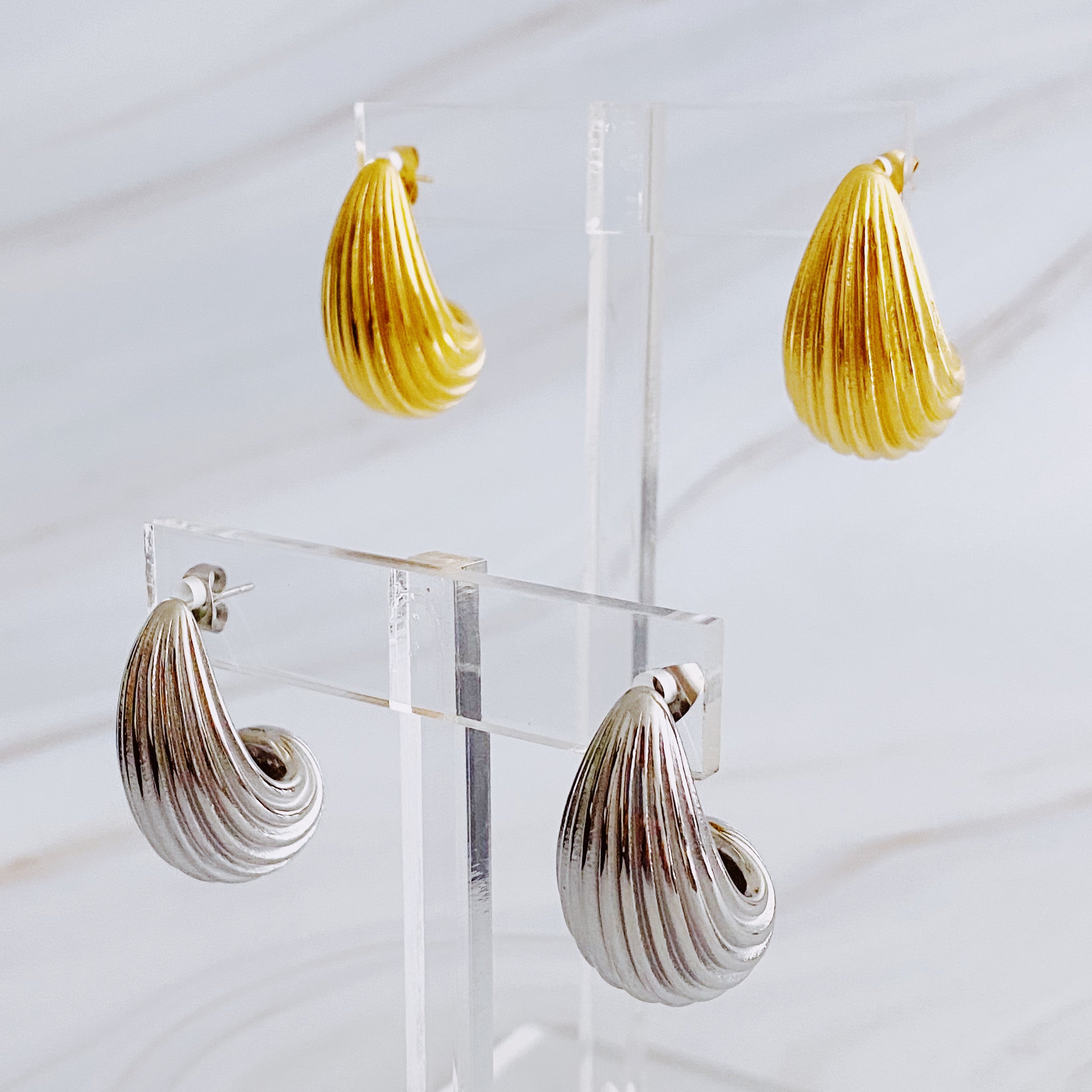 Elegant Cabled Teardrop Solid Stud Earrings in 18k gold plated stainless steel with a chic cabled texture.