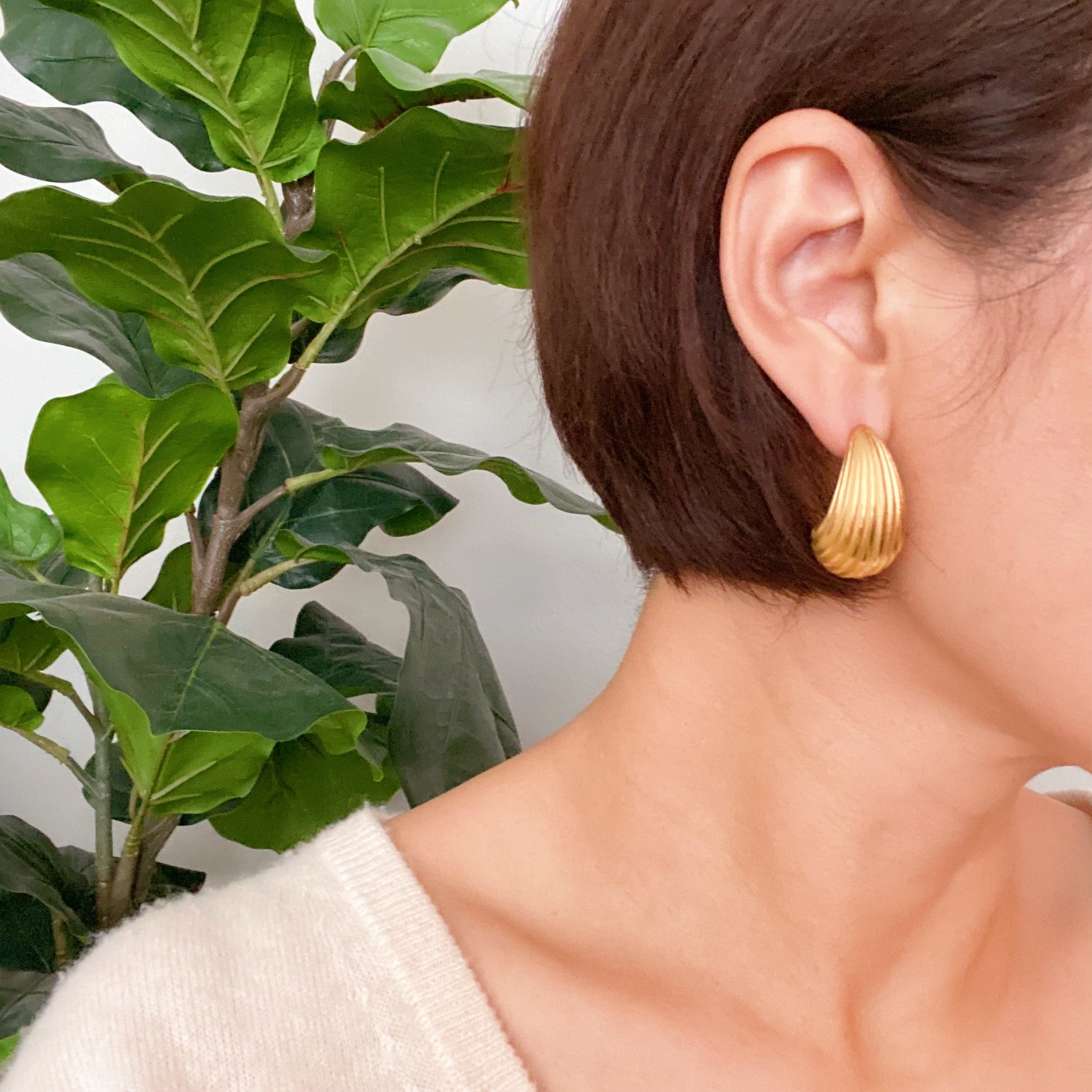 Elegant Cabled Teardrop Solid Stud Earrings in 18k gold plated stainless steel with a chic cabled texture.