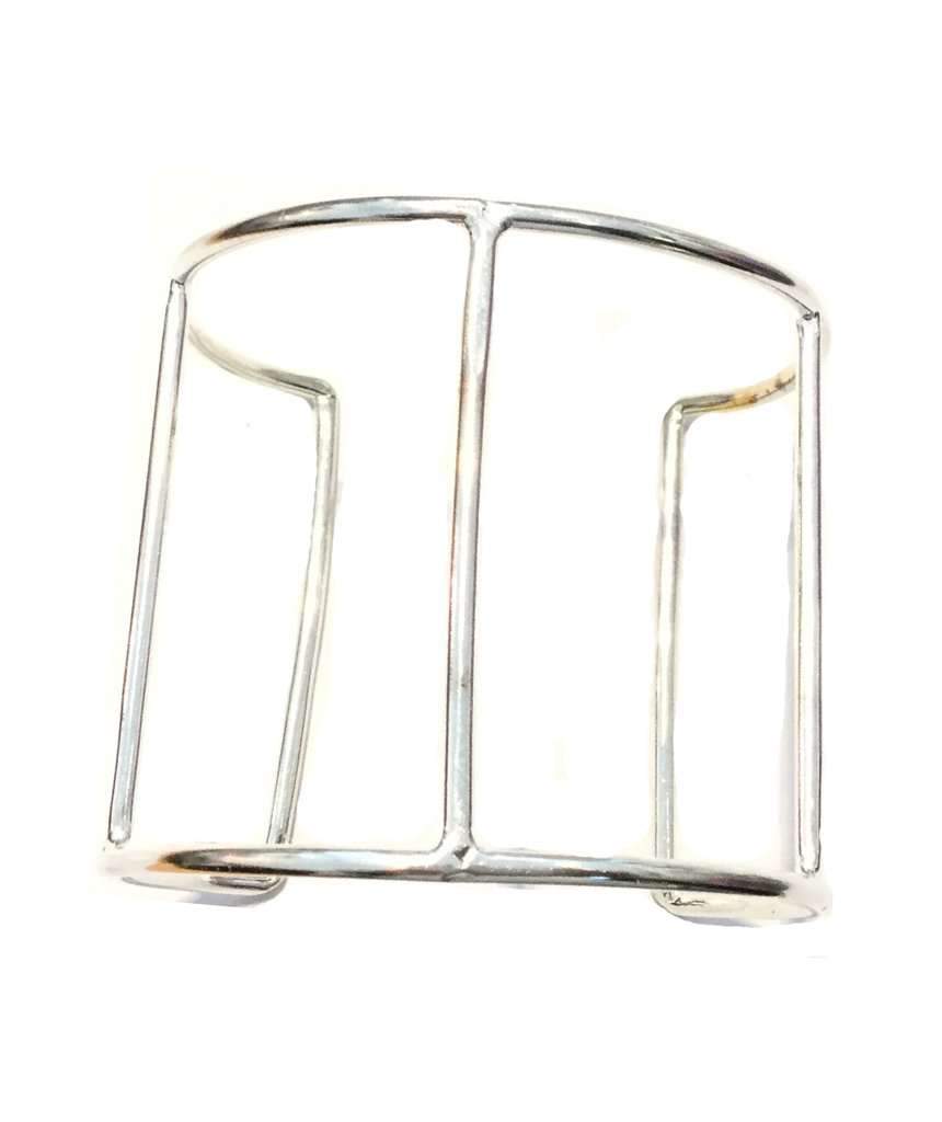 A stylish Cage Cuff Bracelet in gold and silver, showcasing its minimalist design and adjustable fit.