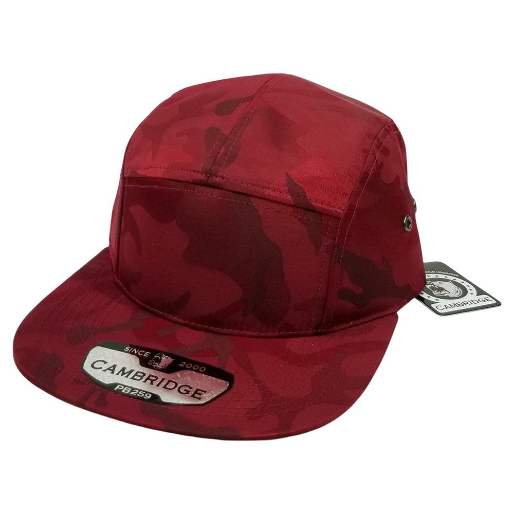 A pack of 6 CAMBRIDGE SHINY CAMO CAMPER hats featuring a shiny camouflage design, flat visor, and high-profile shape, made from 100% polyester.