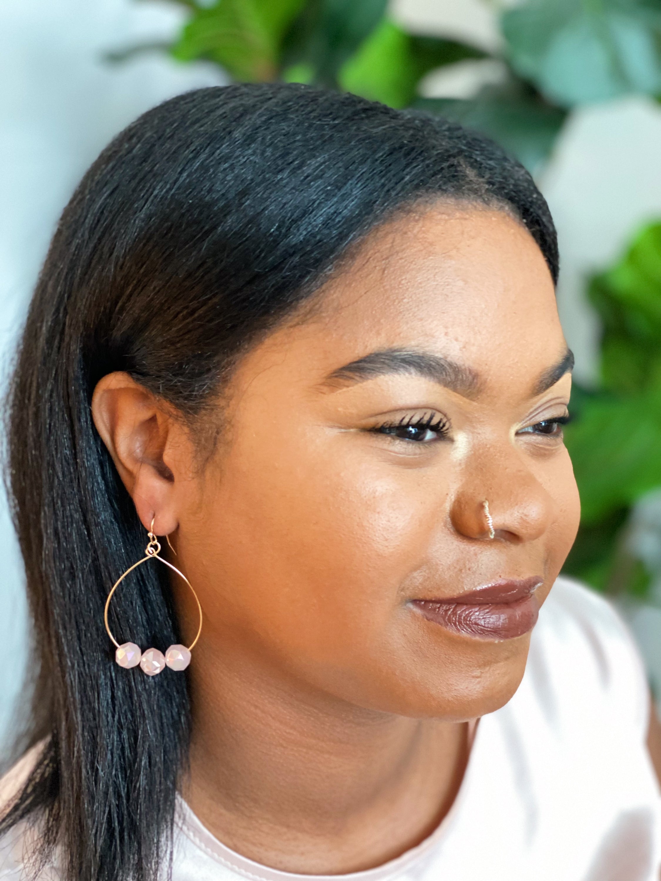 Elegant Candy Beads Dangle Earrings featuring teardrop shape and three faceted glass beads reflecting light beautifully.