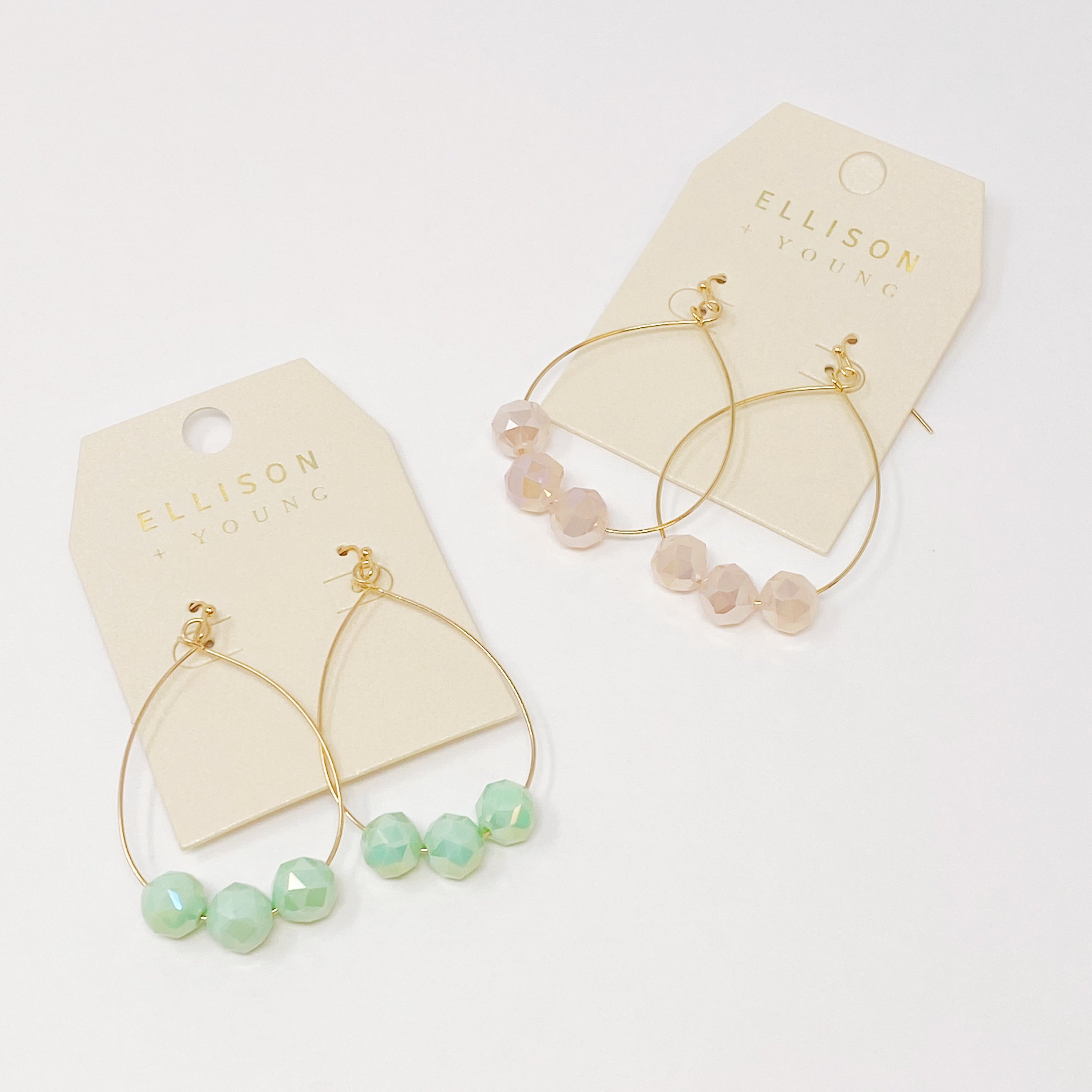 Elegant Candy Beads Dangle Earrings featuring teardrop shape and three faceted glass beads reflecting light beautifully.