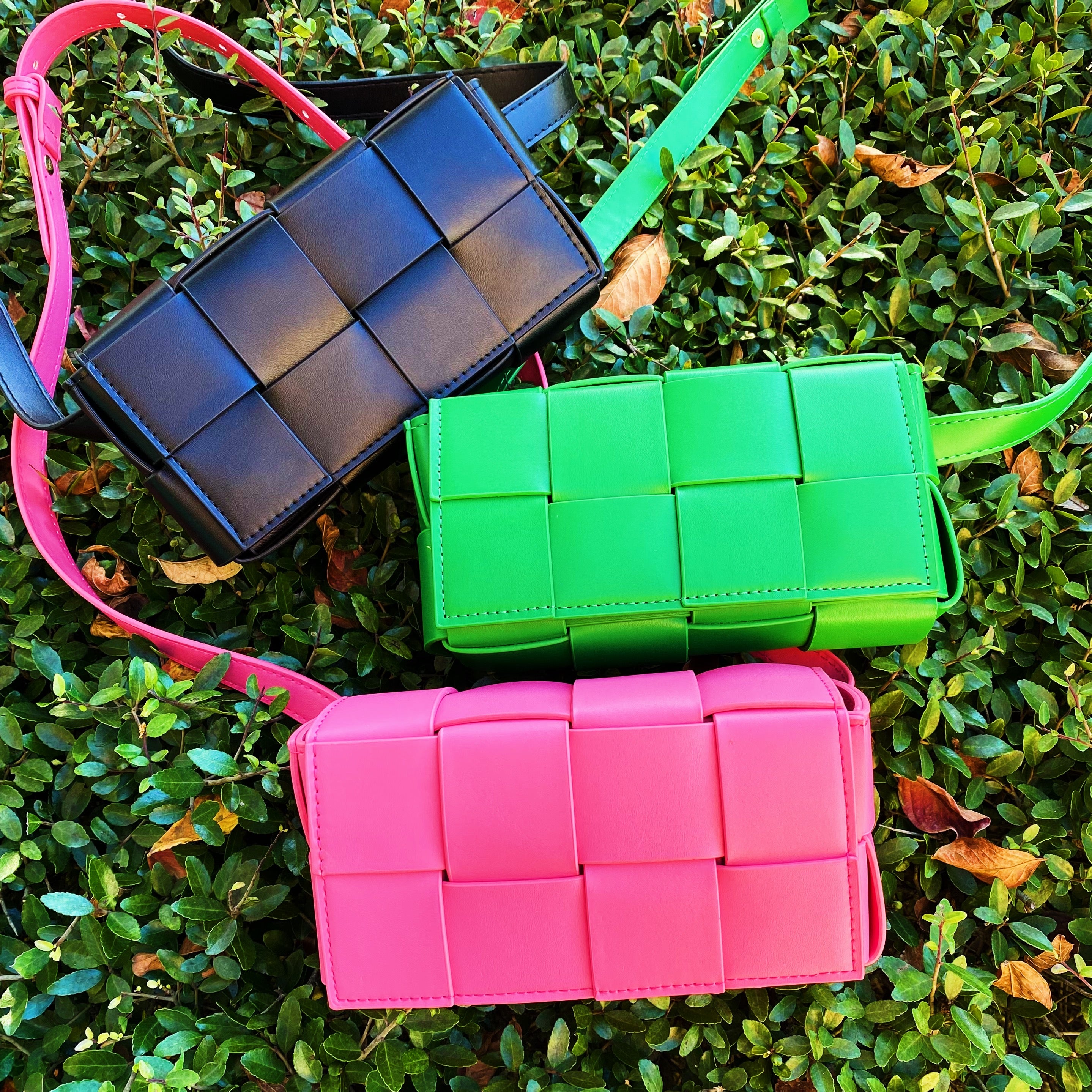 Candy Cube Woven Sling Bag featuring a stylish woven design, adjustable strap, and gold tone hardware in various colors.