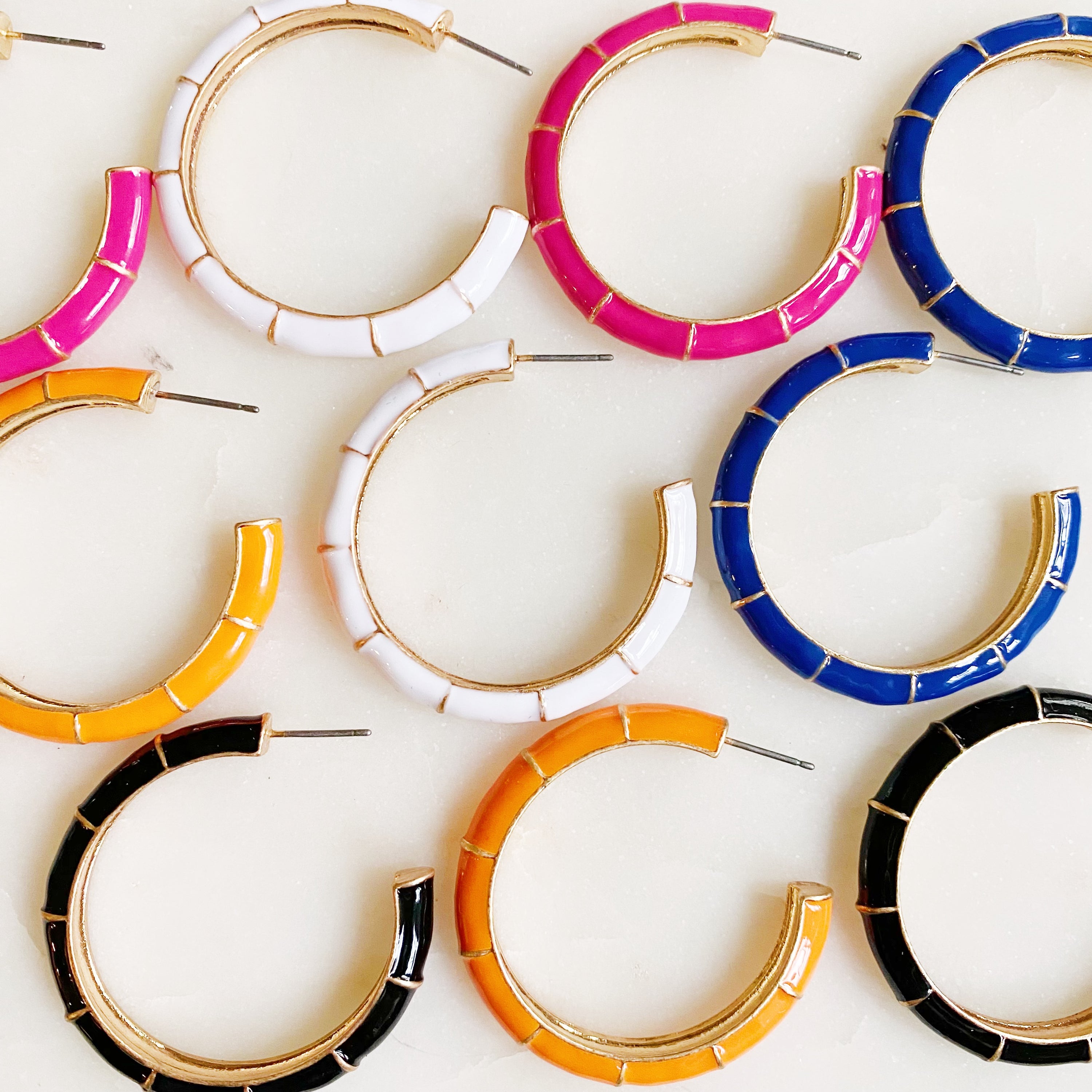 Candy Drop Colored Hoop Earrings featuring vibrant enamel finish and gold plated alloy metal, perfect for everyday wear.