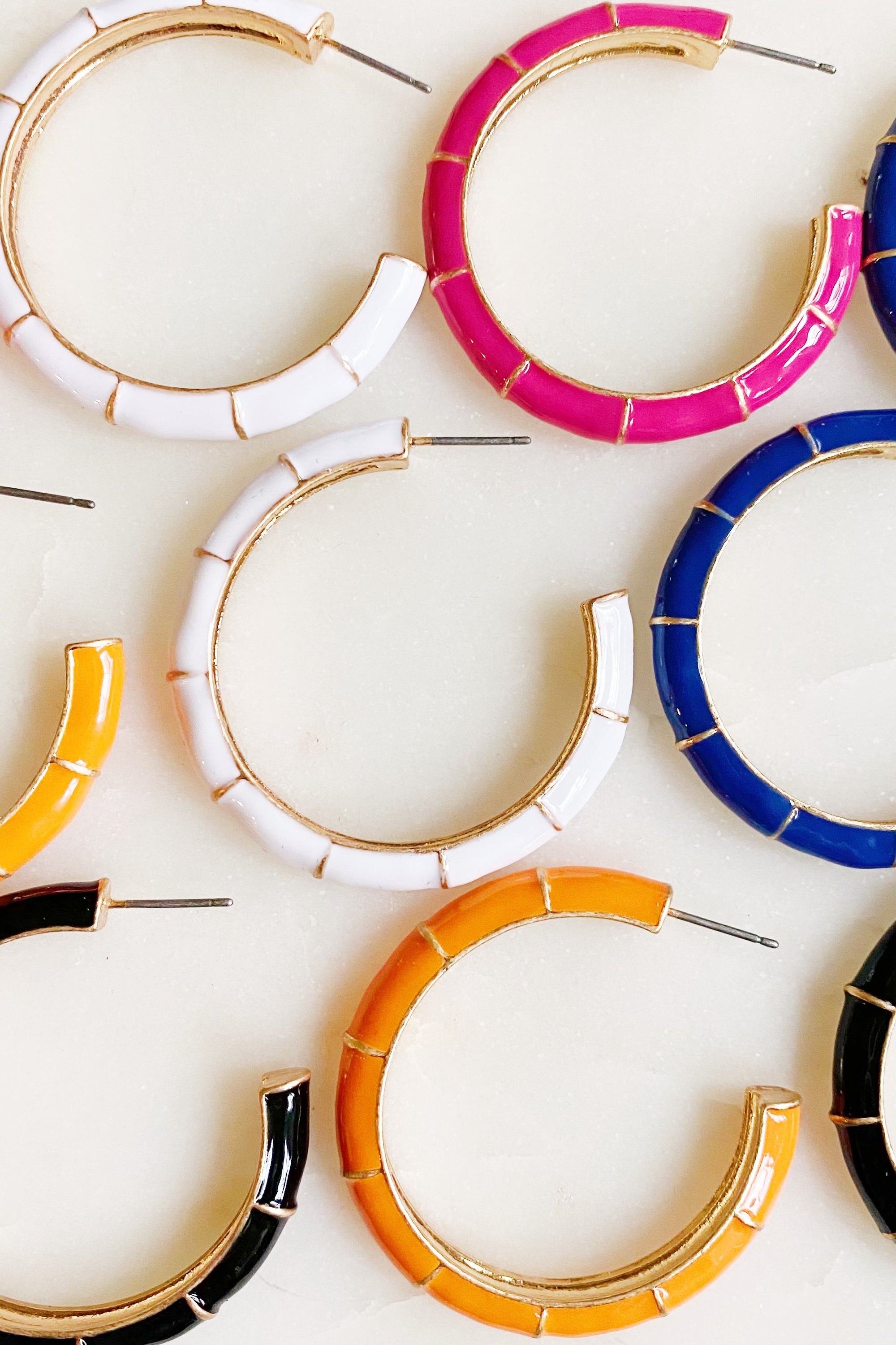 Candy Drop Colored Hoop Earrings featuring vibrant enamel finish and gold plated alloy metal, perfect for everyday wear.