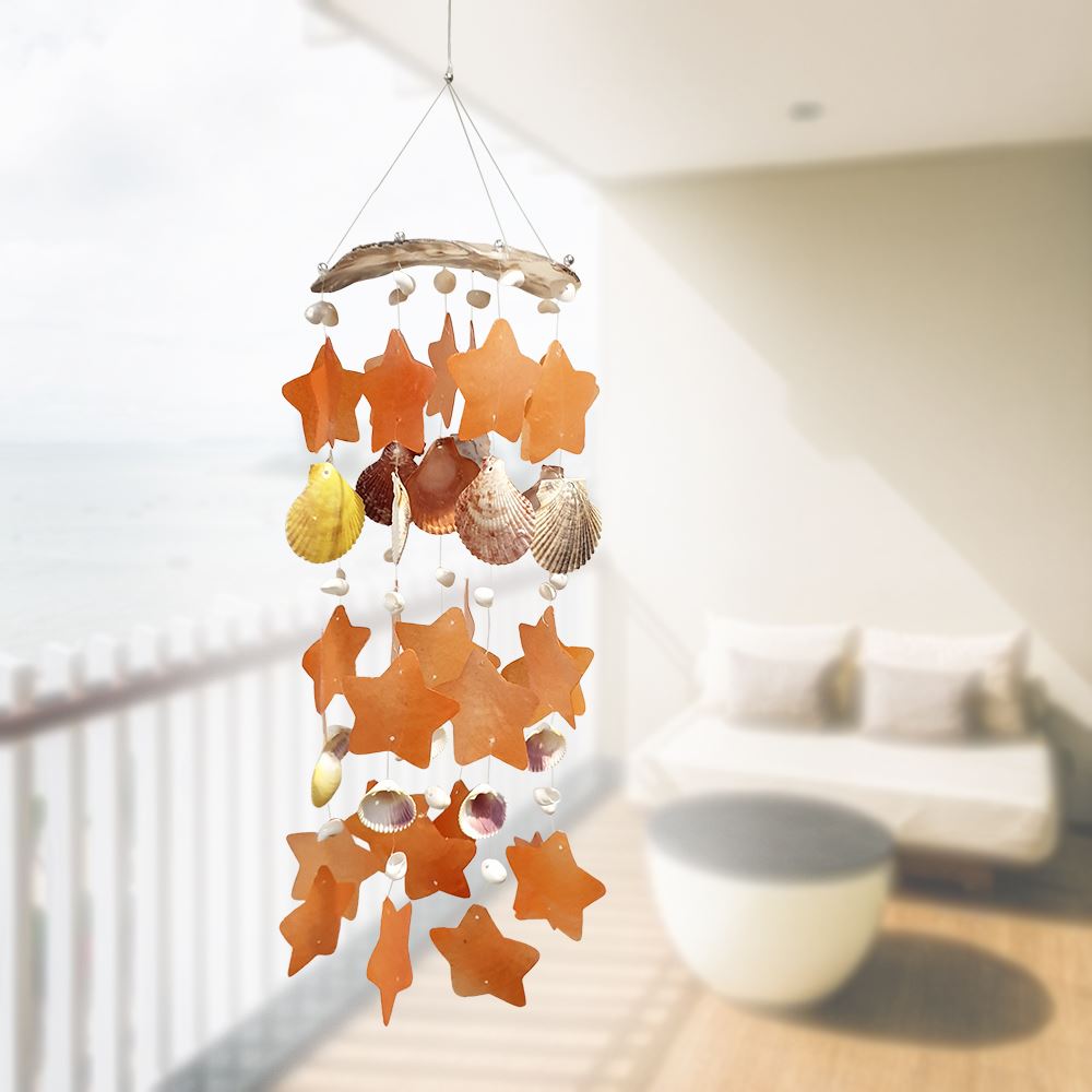 A beautifully handcrafted Capiz & Seashell Wind Chime, featuring delicate capiz shells in a soothing design, perfect for indoor or outdoor decor.