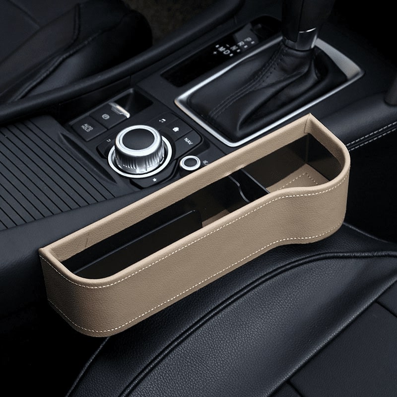 Multifunctional Car Seat Organizer in a vehicle, showcasing its compartments for phone, snacks, and other essentials.