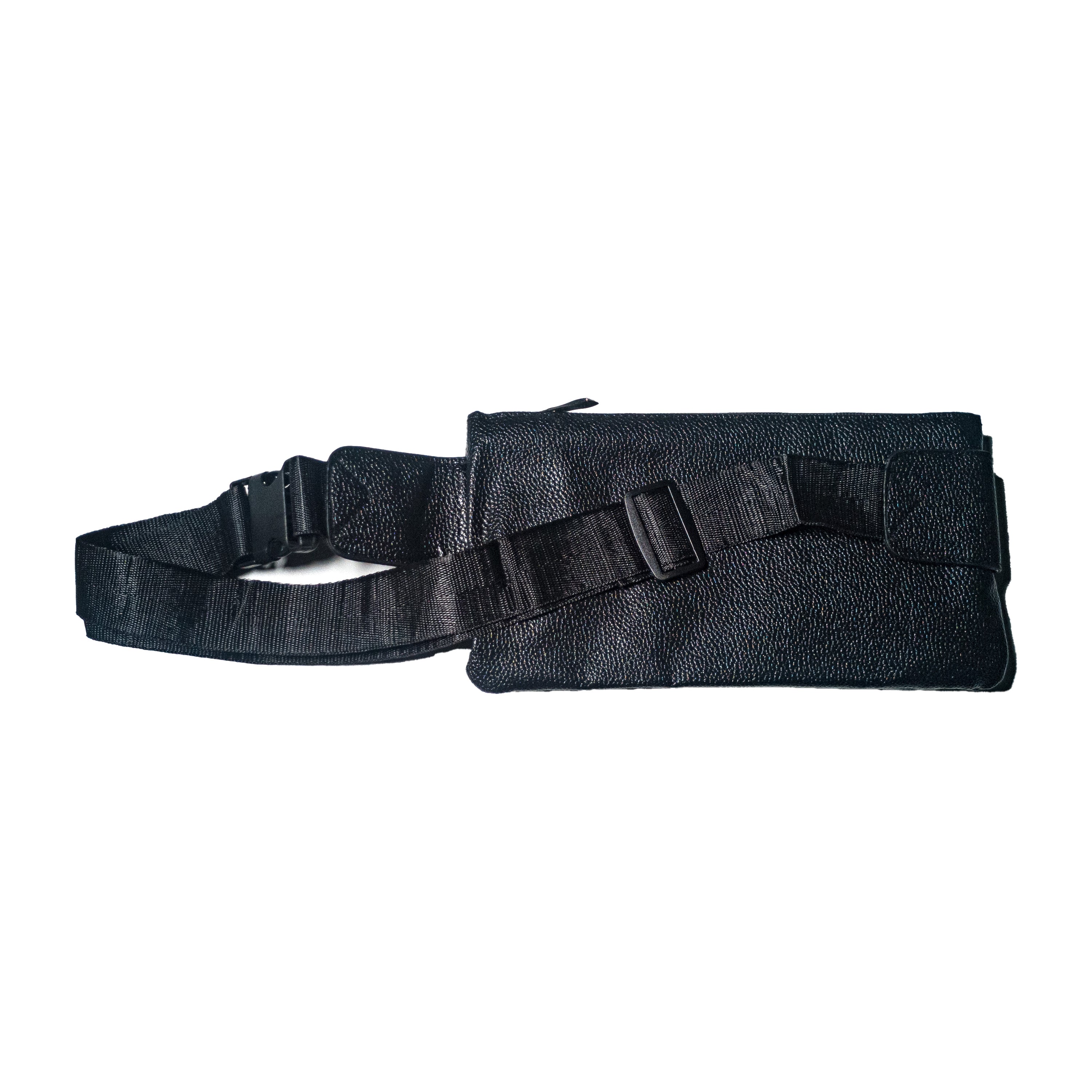 Carl Imro BSN fanny pack in black and brown, made from recycled PU leather, showcasing its stylish design and adjustable strap.