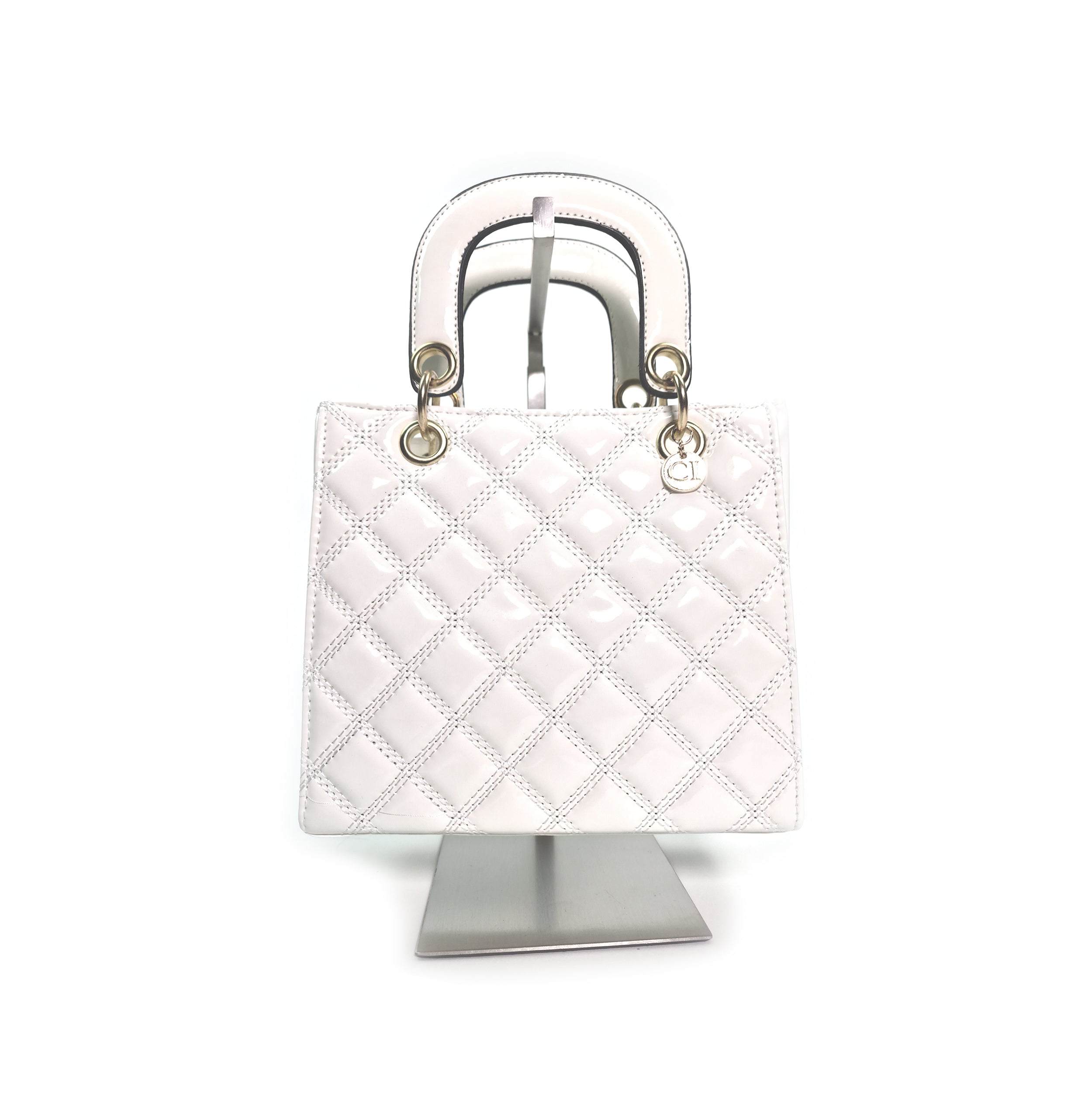 Carl Imro BUJBag in white, made from recycled materials, featuring a stylish design and single strap.