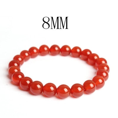 A vibrant Carnelian Bracelet designed for Aries, showcasing rich orange-red stones that symbolize protection and motivation.