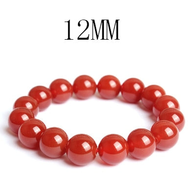 A vibrant Carnelian Bracelet designed for Aries, showcasing rich orange-red stones that symbolize protection and motivation.