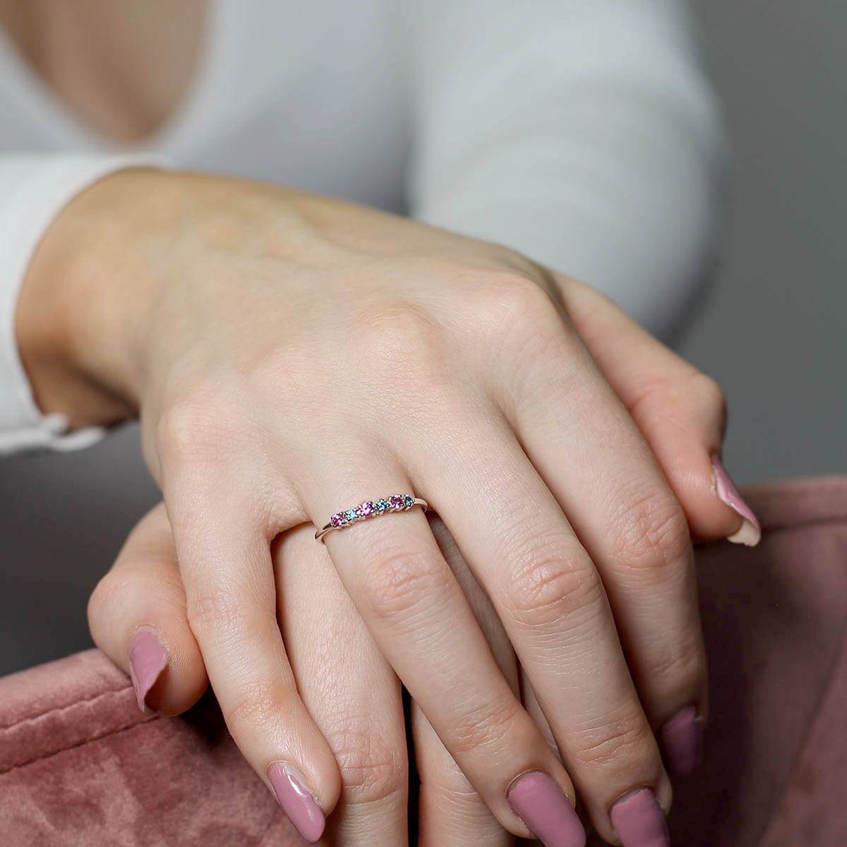 Carnival slim stacking ring featuring colorful sapphires set in sterling silver, showcasing a chic and elegant design.