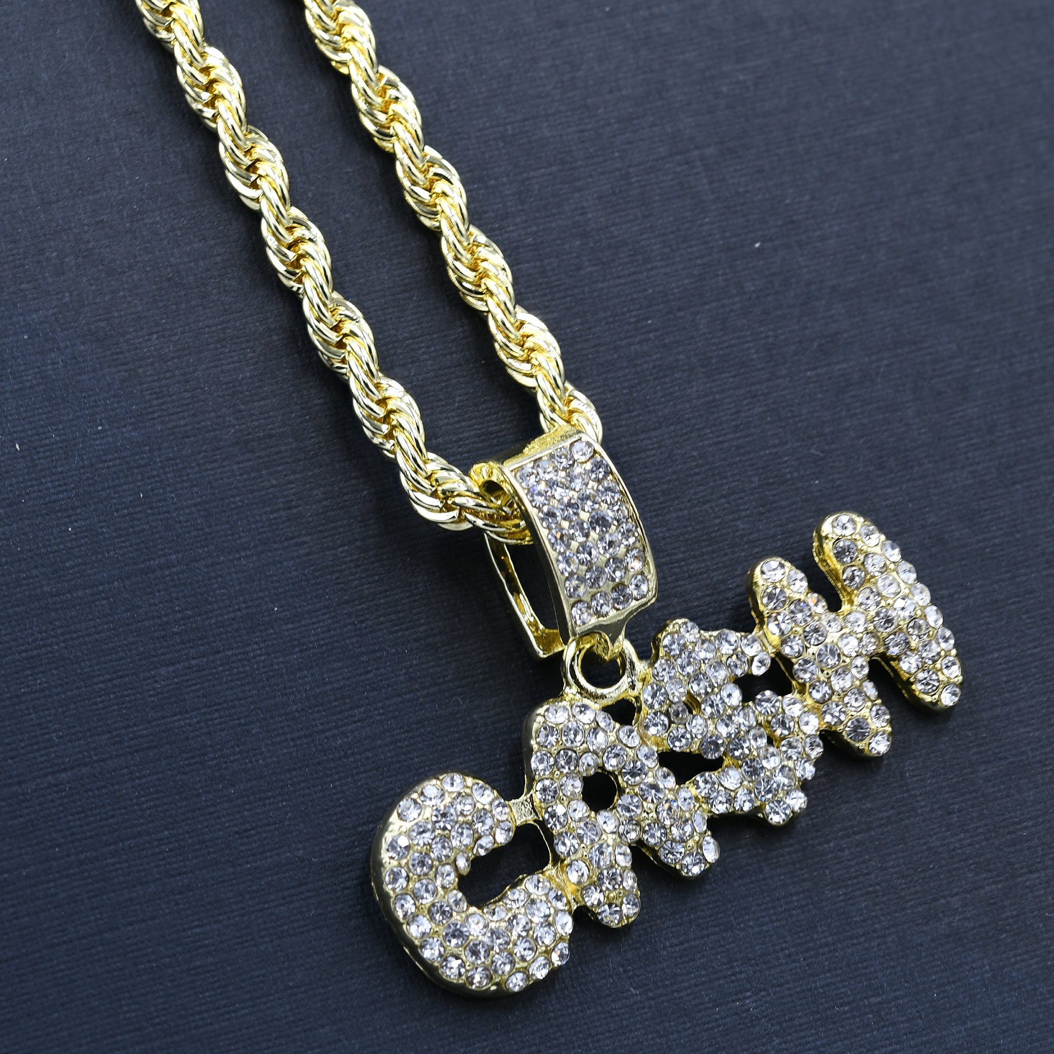 CASH CHAIN AND CHARM - D90342 featuring a crystal-studded pendant on a 24'' rope chain, perfect for hip-hop fashion.