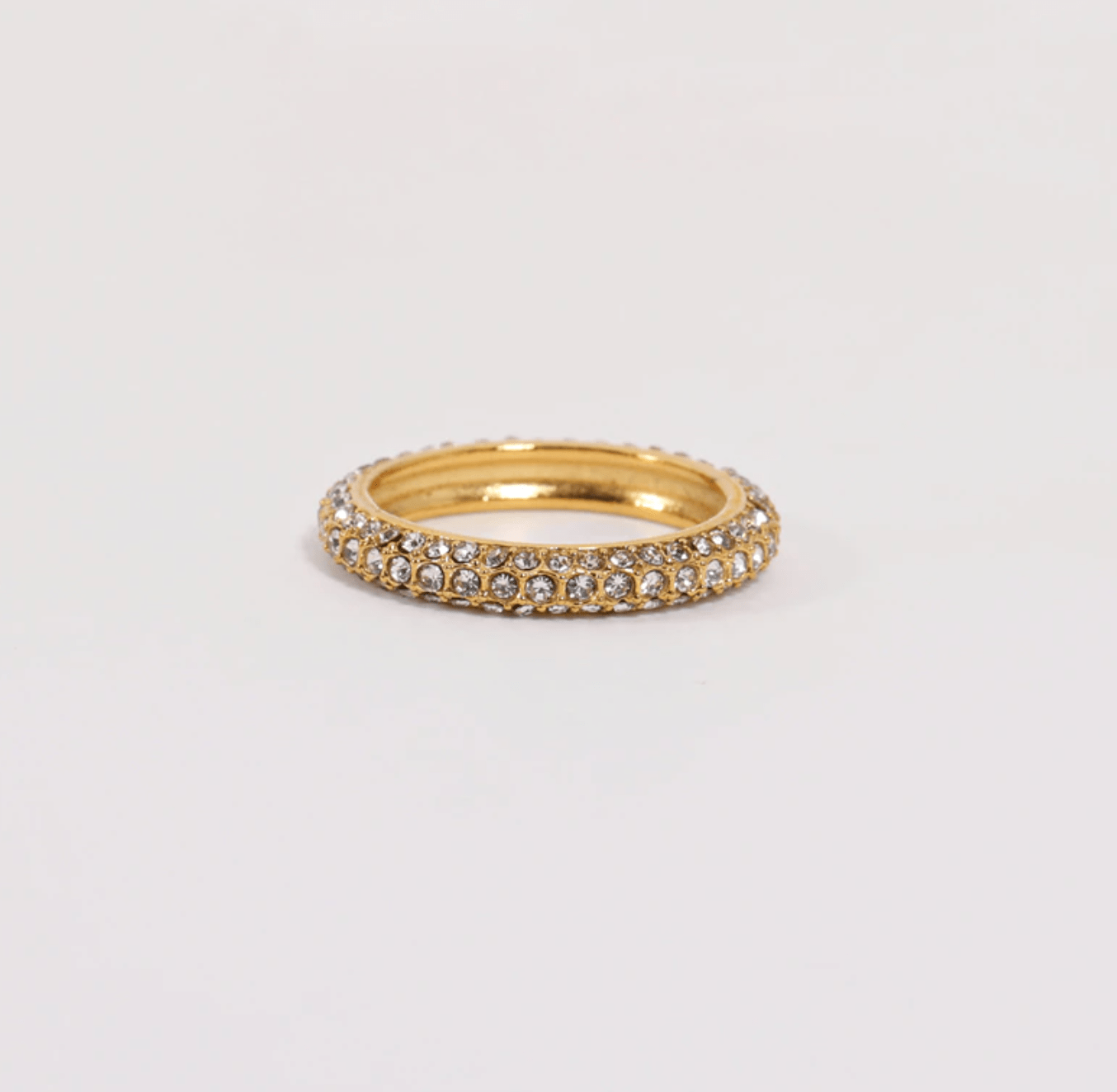 Catania Crystal Pavé Gold Band Ring featuring a chic silhouette with sparkling zircon crystals and a luxurious gold finish.