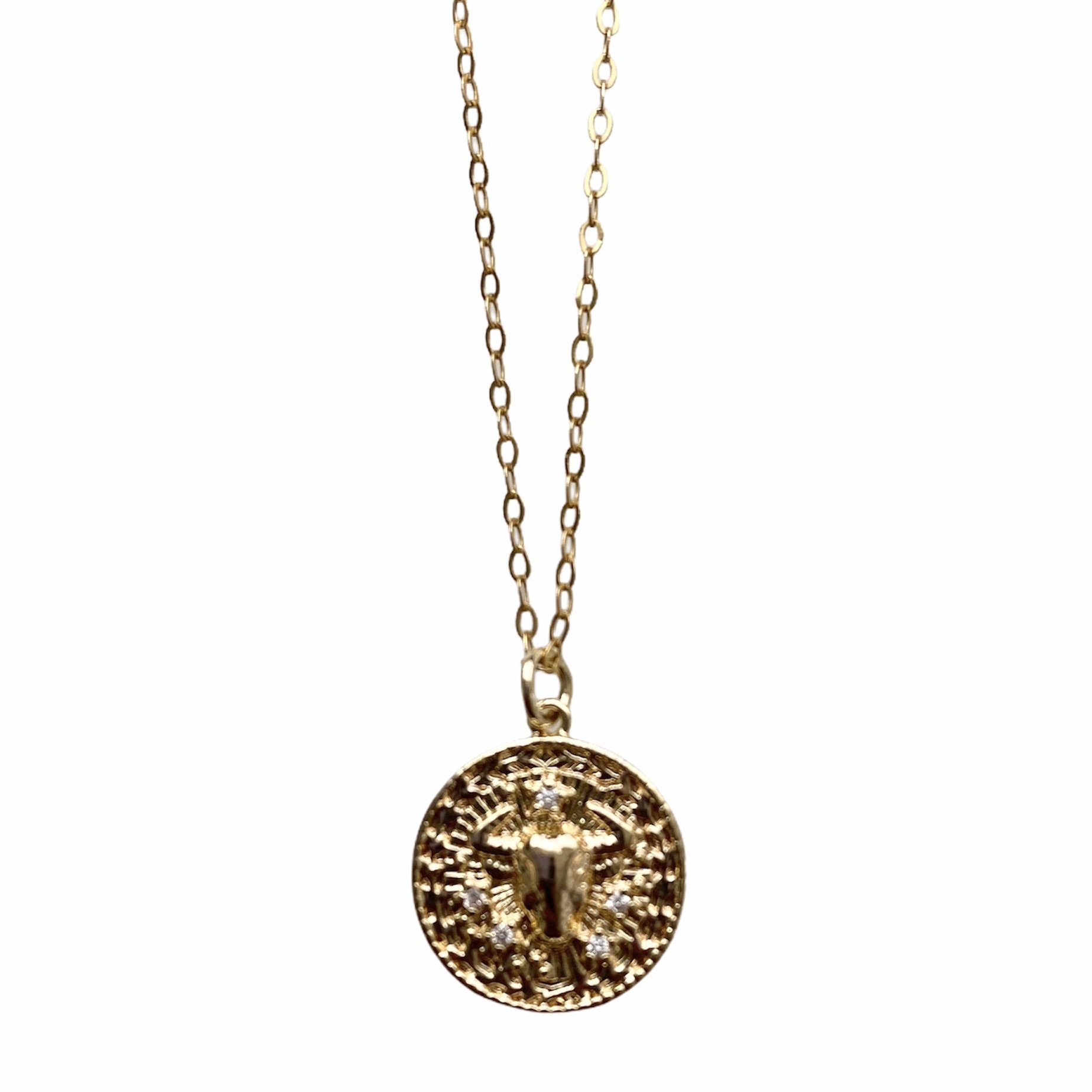 Celestial Vibes Zodiac Necklace featuring a 14K gold filled chain and zirconia encrusted pendant, elegantly displayed.