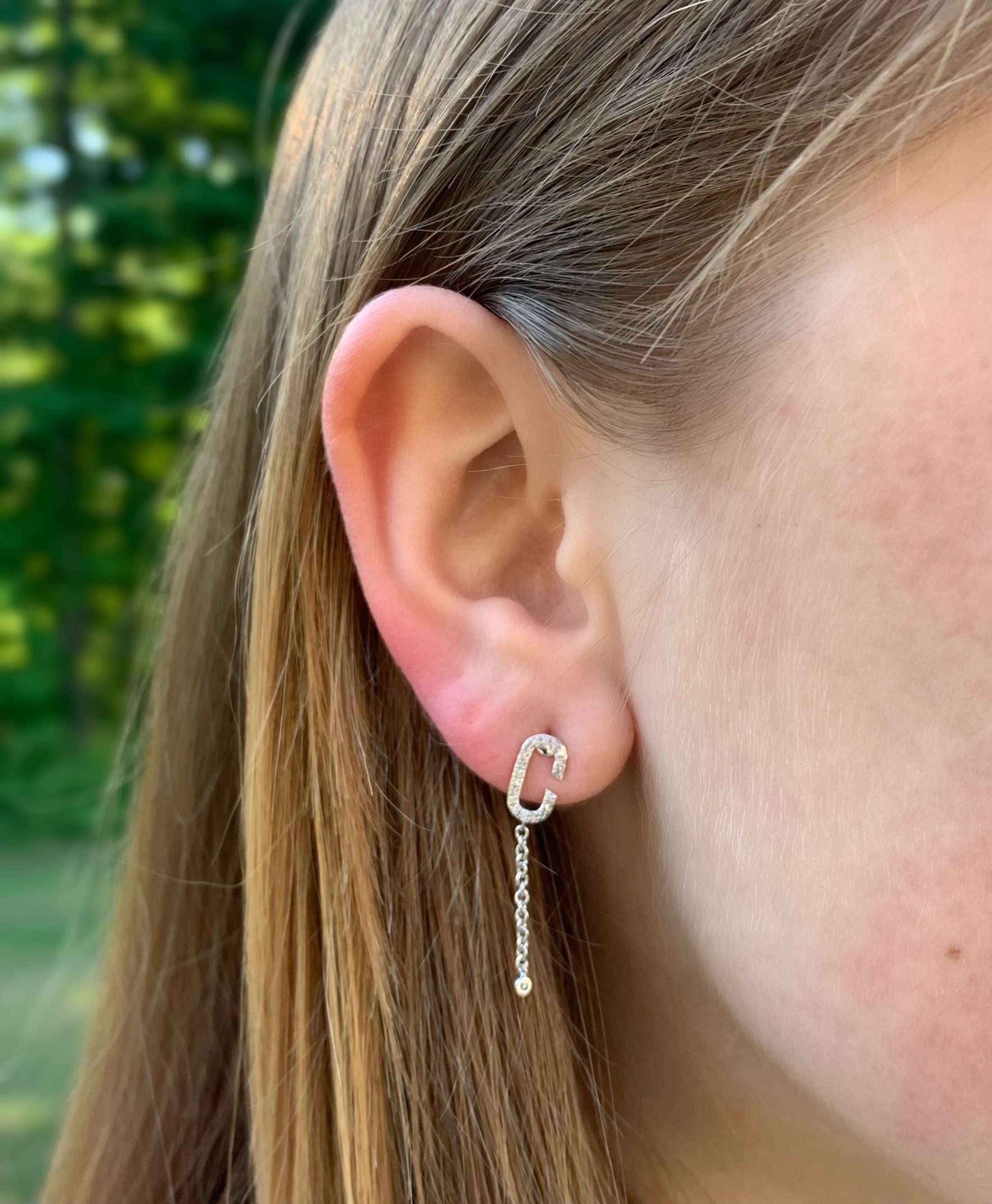 Celia C Diamond Drop Earrings in Sterling Silver featuring natural diamonds in a C-shaped design.