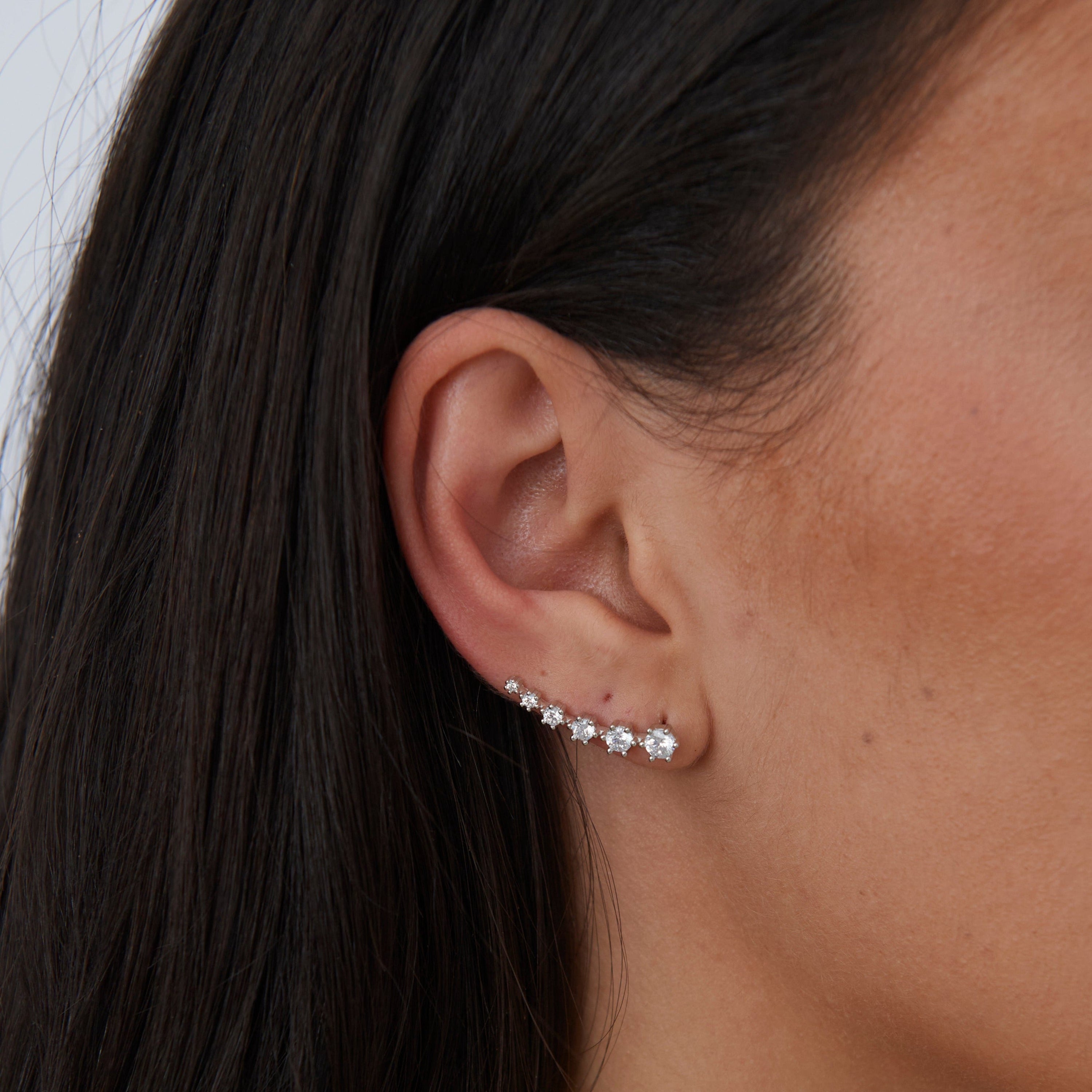 Celina CZ Bar Earring featuring a gradient of cubic zirconia stones from large to small, showcasing elegance and style.