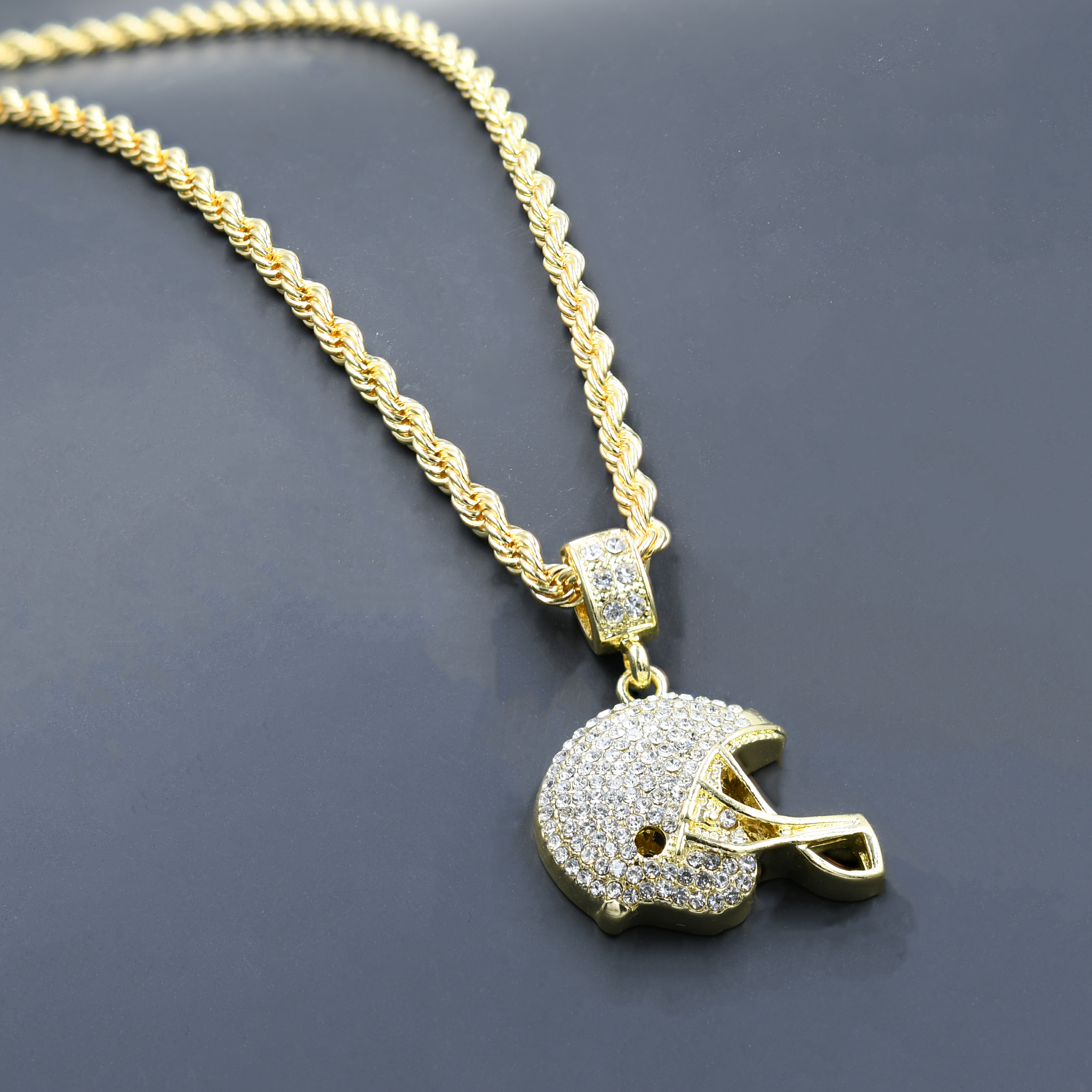 CHAIN AND CHARM - D910492 featuring a crystal-studded pendant on a 24'' rope chain, showcasing intricate design and hip-hop style.