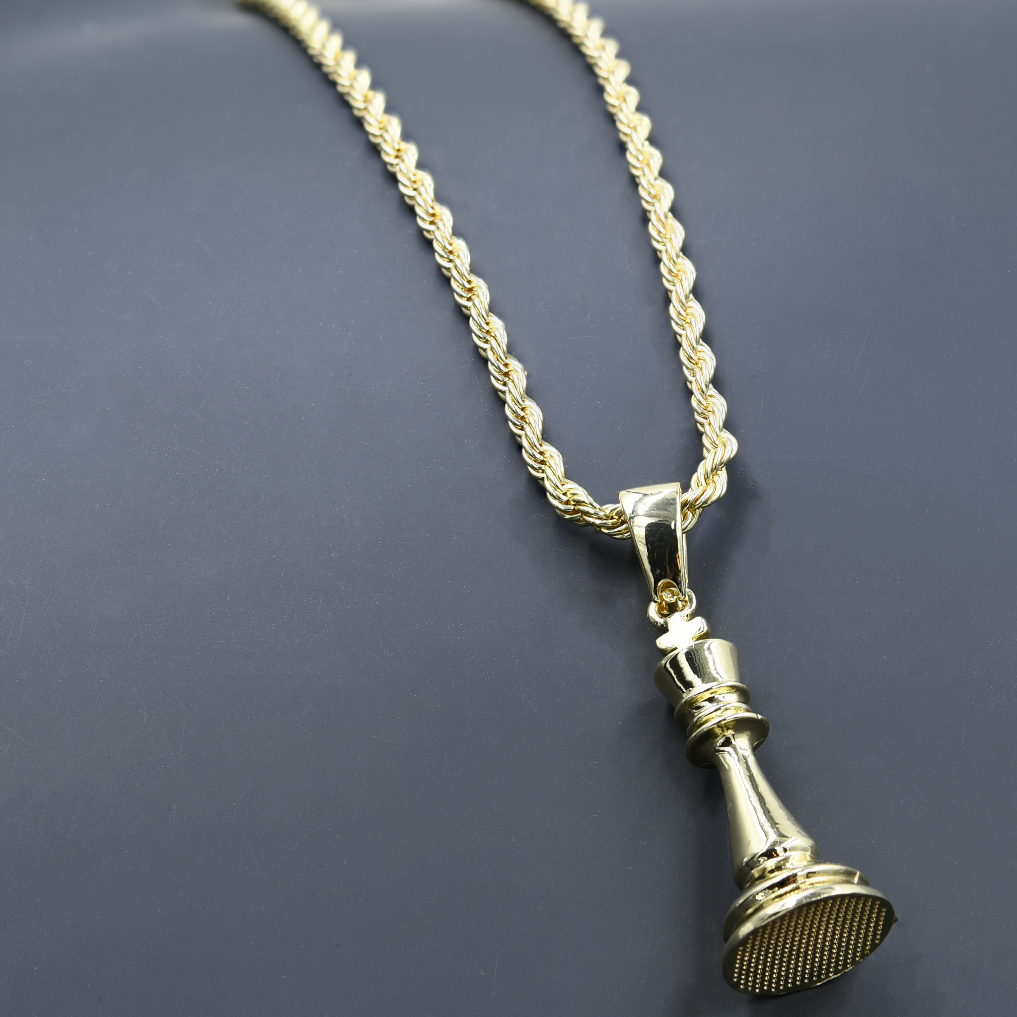 A stunning hip-hop chain and charm featuring a crystal stone studded pendant and a 24'' rope chain, perfect for bold fashion statements.