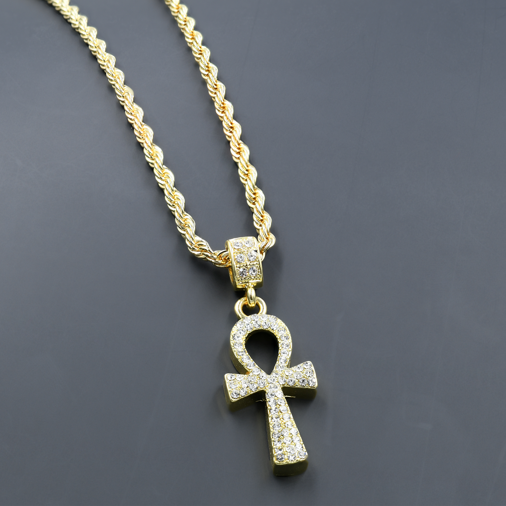 Intricate hip-hop chain and charm with crystal stones on a 24'' rope chain, showcasing a bold and stylish design.