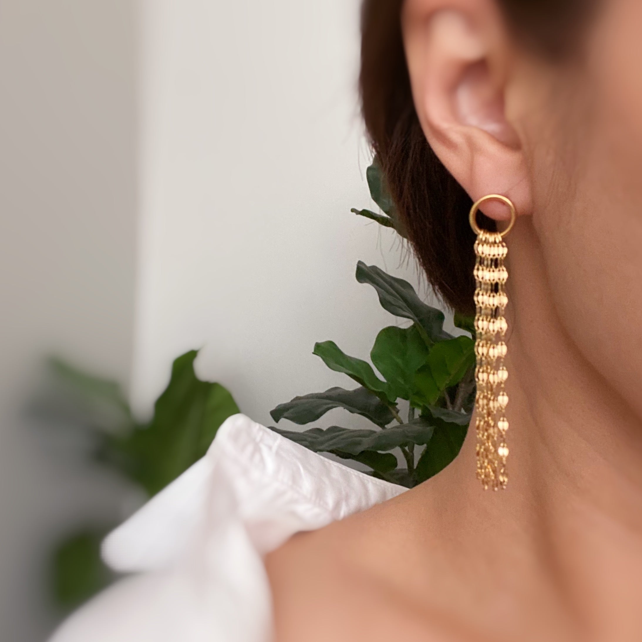 Elegant Chain Drape Dangle Earrings in 18k gold plated stainless steel, showcasing a delicate draping design.