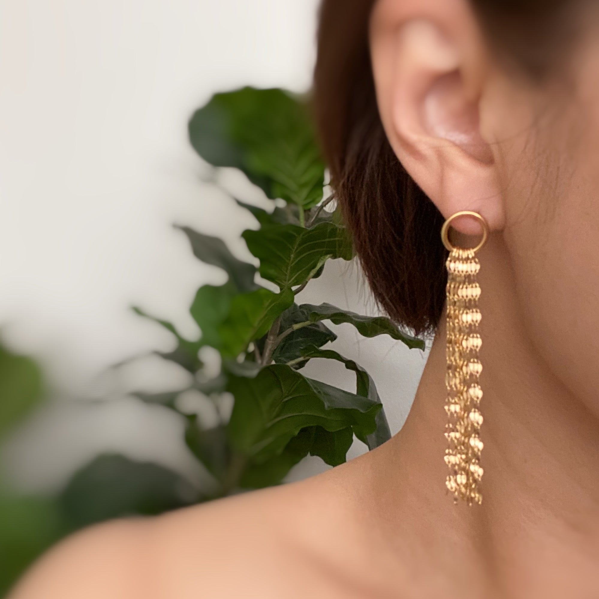 Elegant Chain Drape Dangle Earrings in 18k gold plated stainless steel, showcasing a delicate draping design.