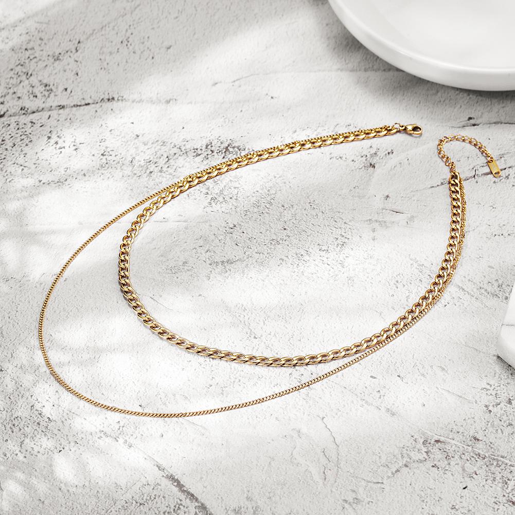 A stylish Chain Layered Necklace made from 316L surgical stainless steel with 14K gold PVD plating, showcasing its elegant layered design.