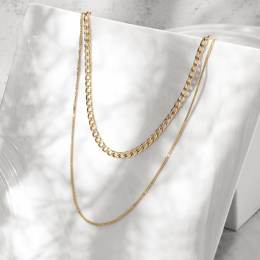 A stylish Chain Layered Necklace made from 316L surgical stainless steel with 14K gold PVD plating, showcasing its elegant layered design.