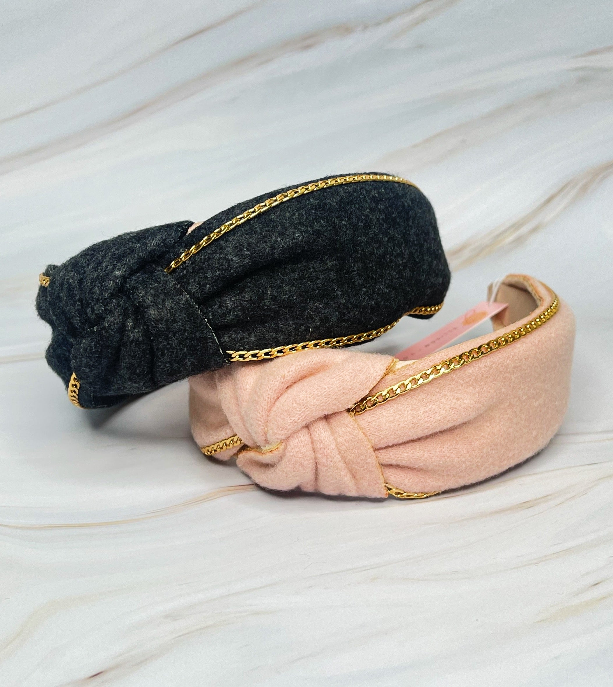 Chained In Line Headband featuring gold chain embellishment, soft fabric, and stylish design.