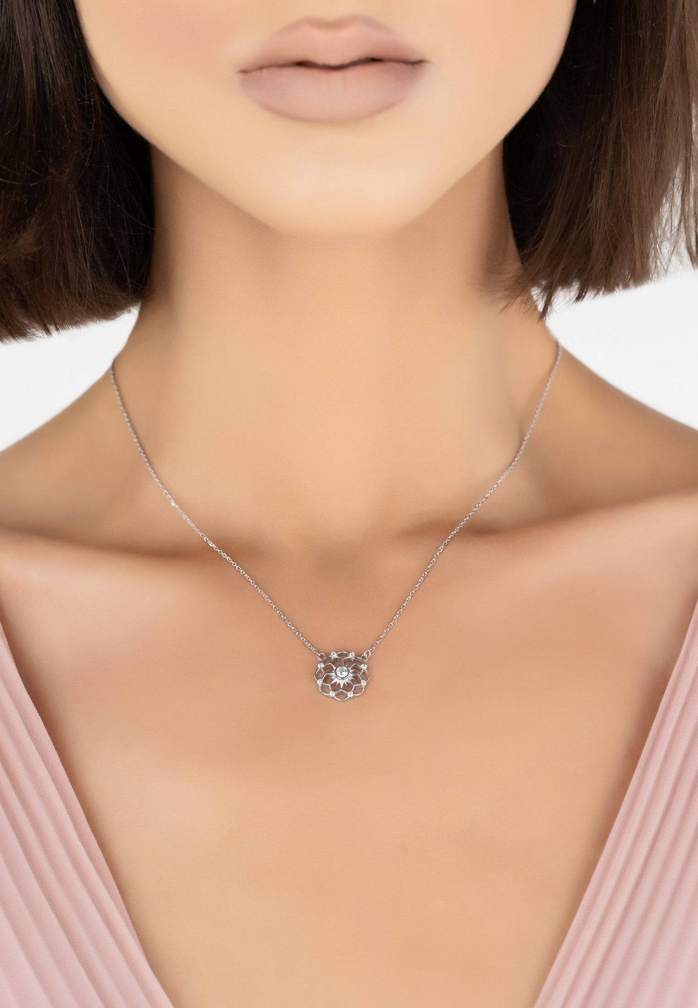 Chakra Pendant Necklace in silver with white zirconia, showcasing a chic design perfect for everyday wear.