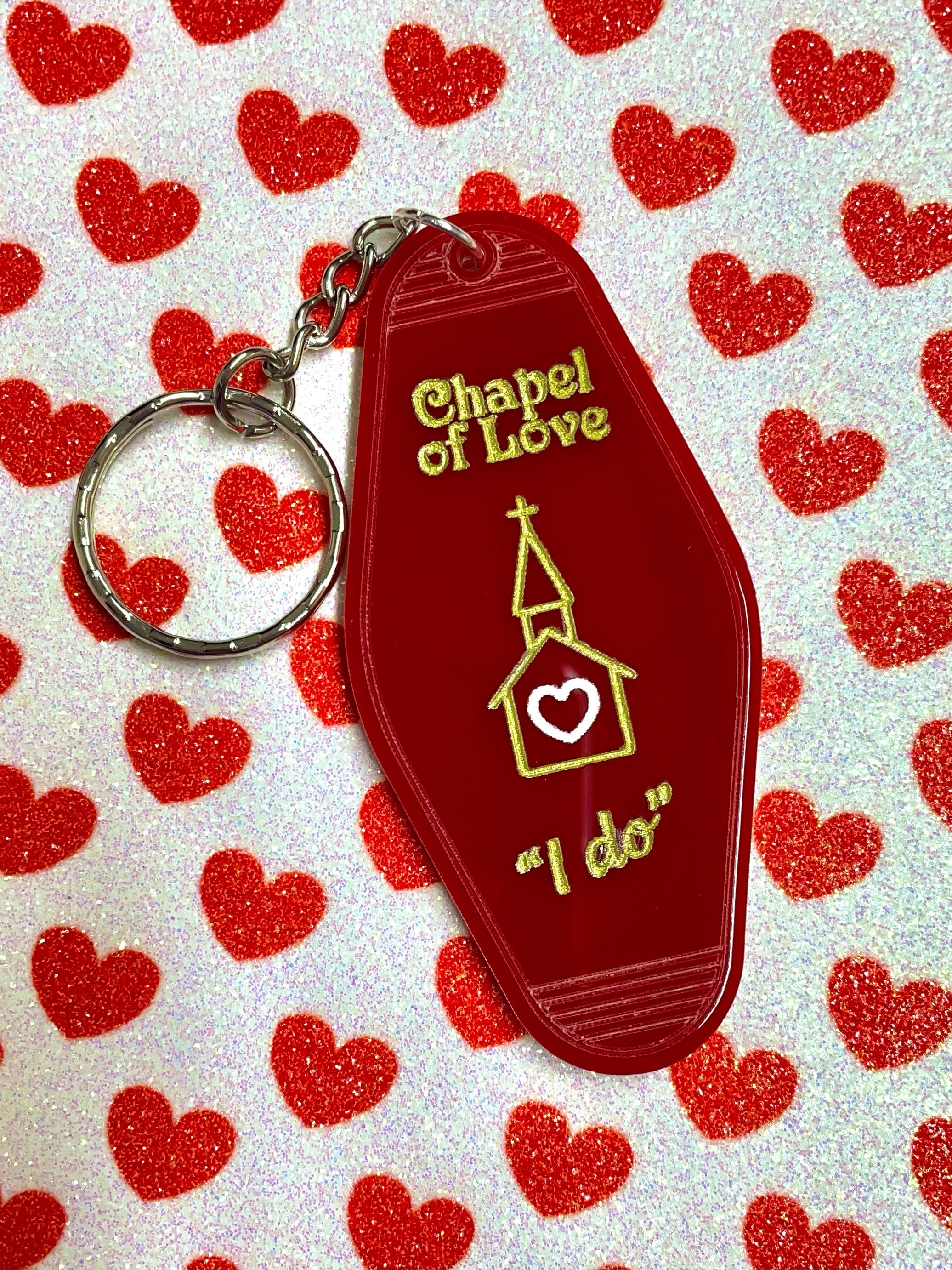 Chapel of Love Keyring featuring laser cut acrylic design, inspired by 1960s and 70s fashion trends, with dimensions of 8cm height and 4cm width.