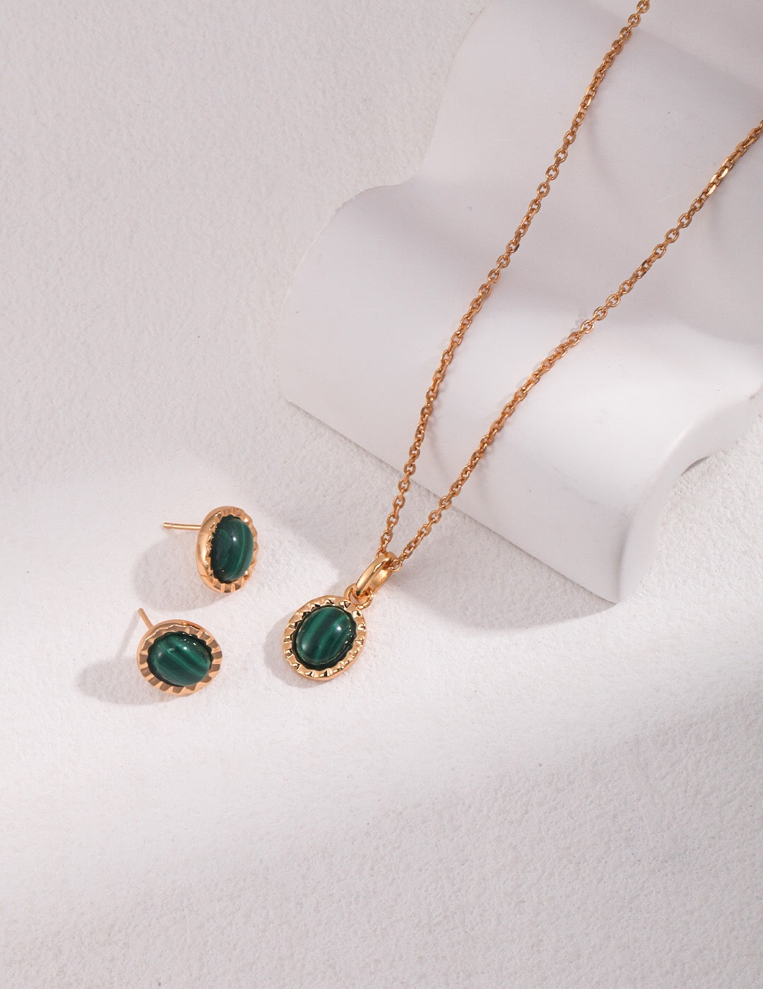 Charm Malachite Stud earrings featuring vibrant green malachite and gold vermeil, elegantly handcrafted for a luxurious look.