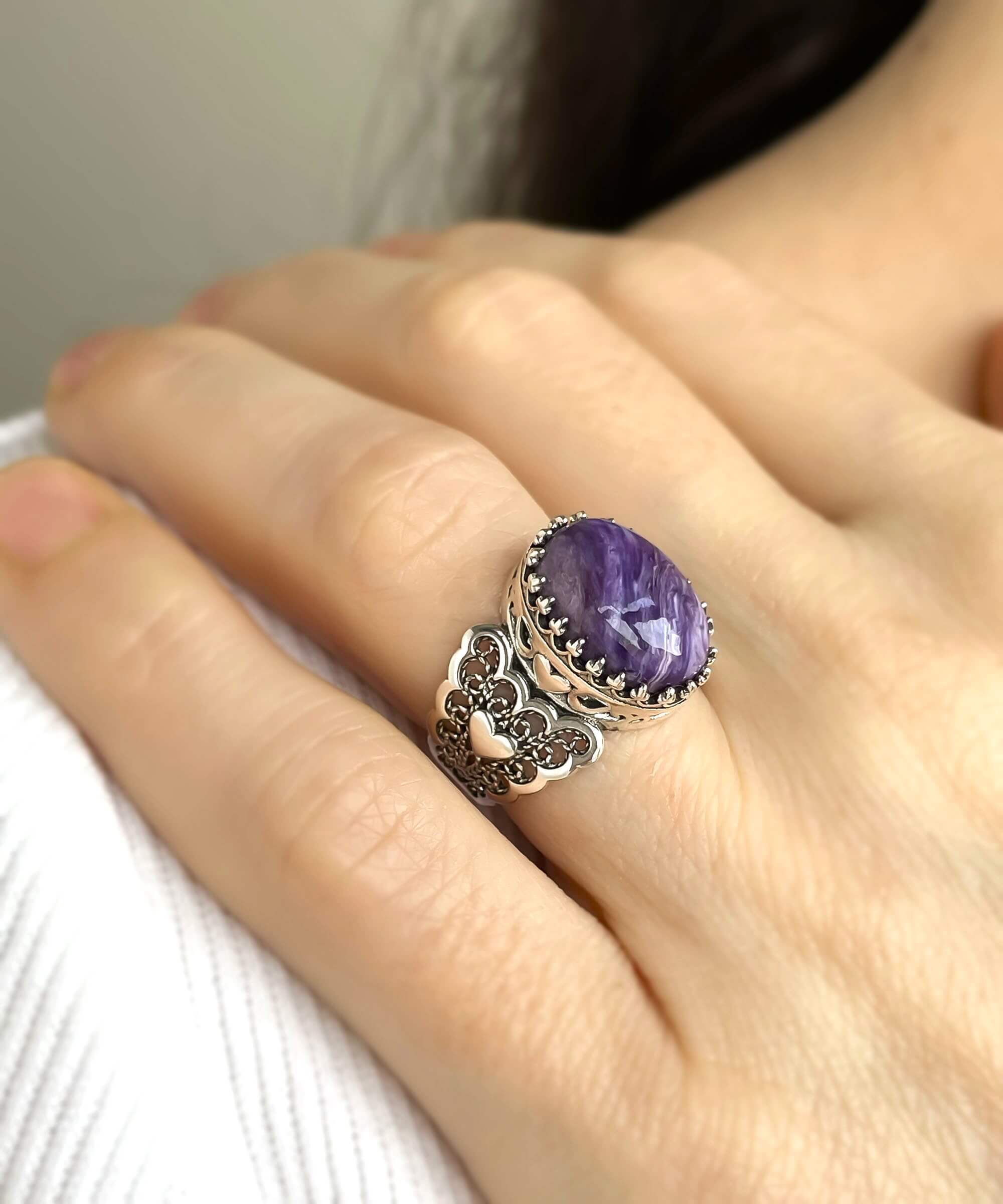 Charoite gemstone double heart ring in detailed filigree art, crafted from 925 sterling silver, showcasing intricate design and elegance.