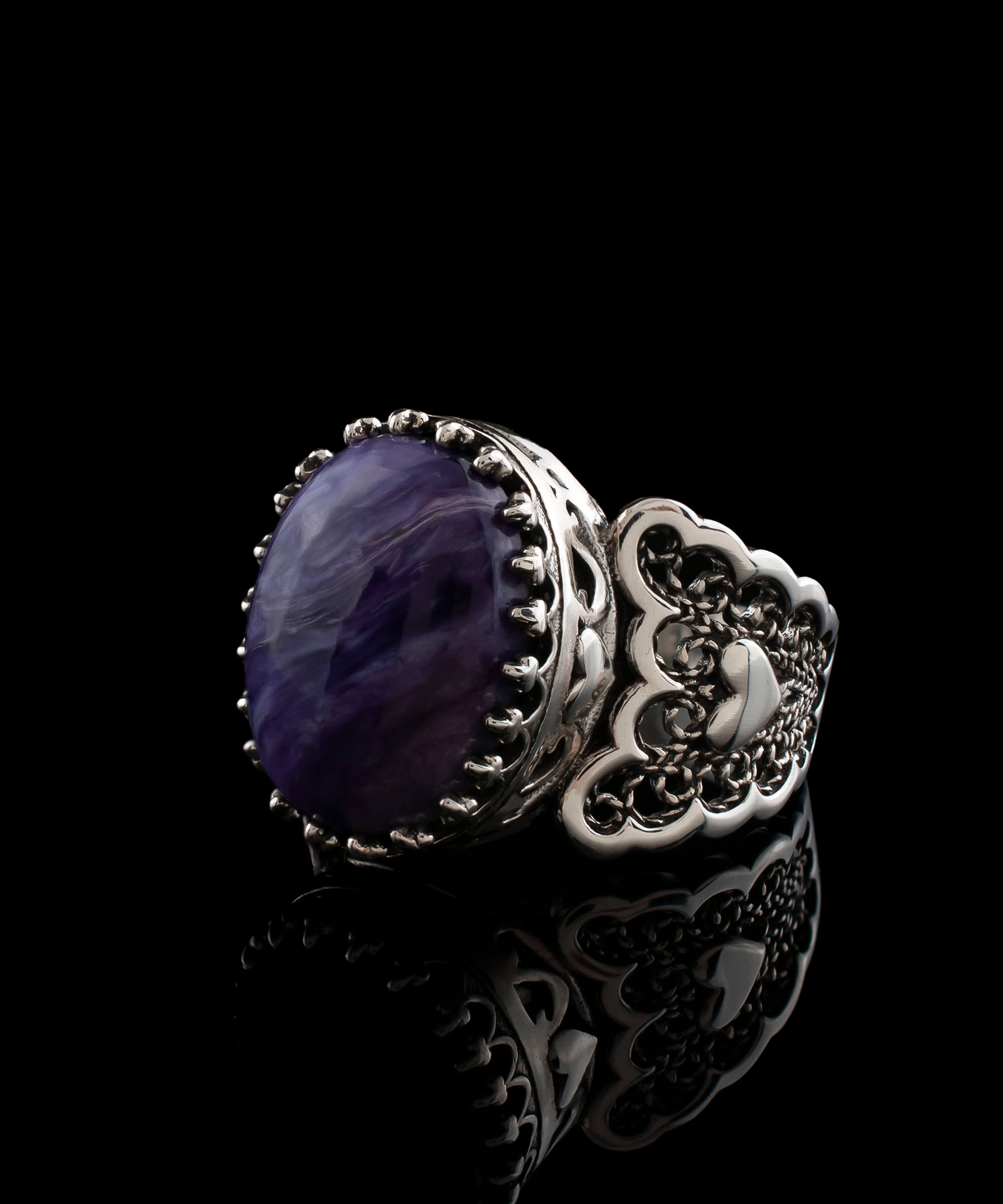 Charoite gemstone double heart ring in detailed filigree art, crafted from 925 sterling silver, showcasing intricate design and elegance.