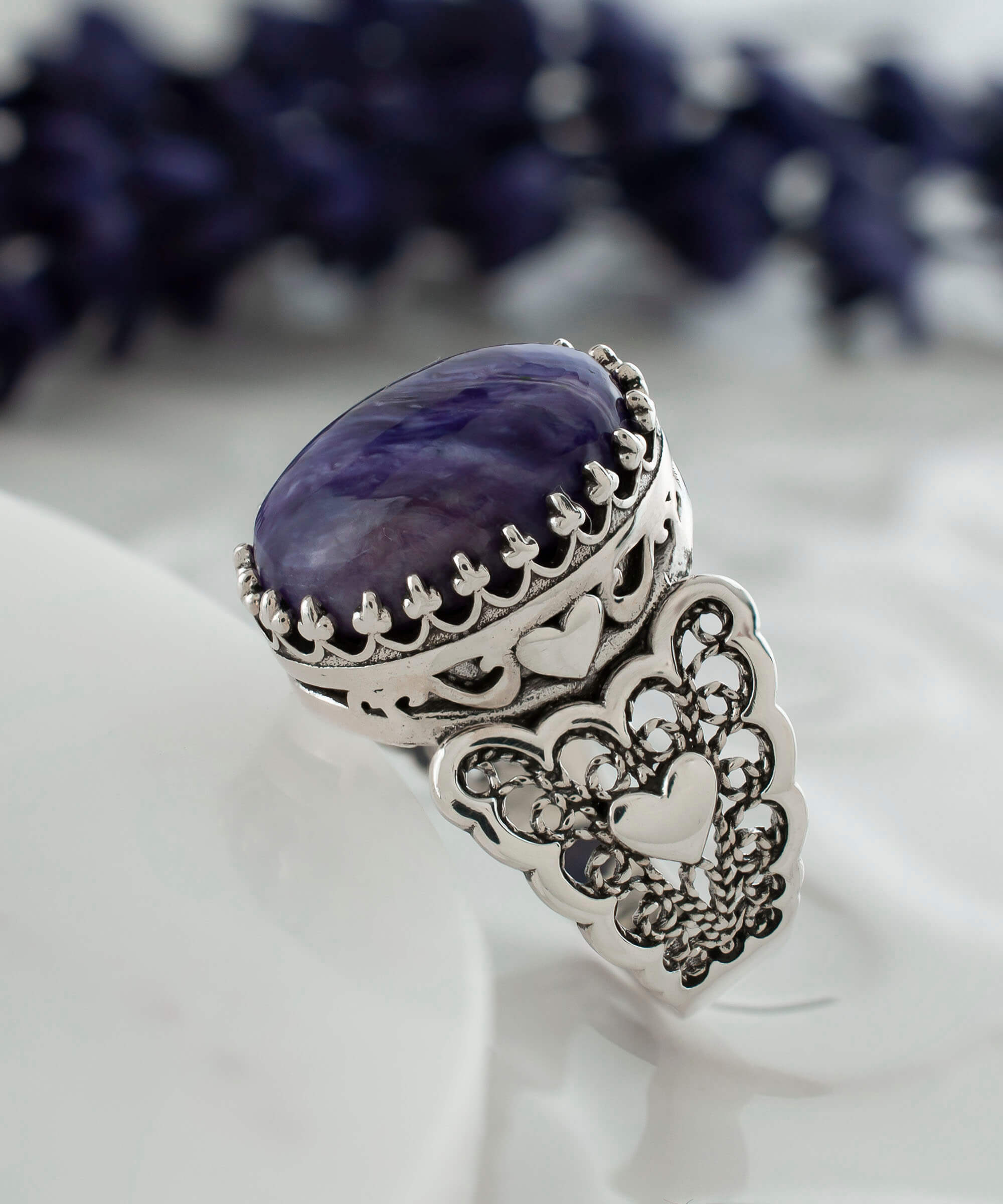 Charoite gemstone double heart ring in detailed filigree art, crafted from 925 sterling silver, showcasing intricate design and elegance.