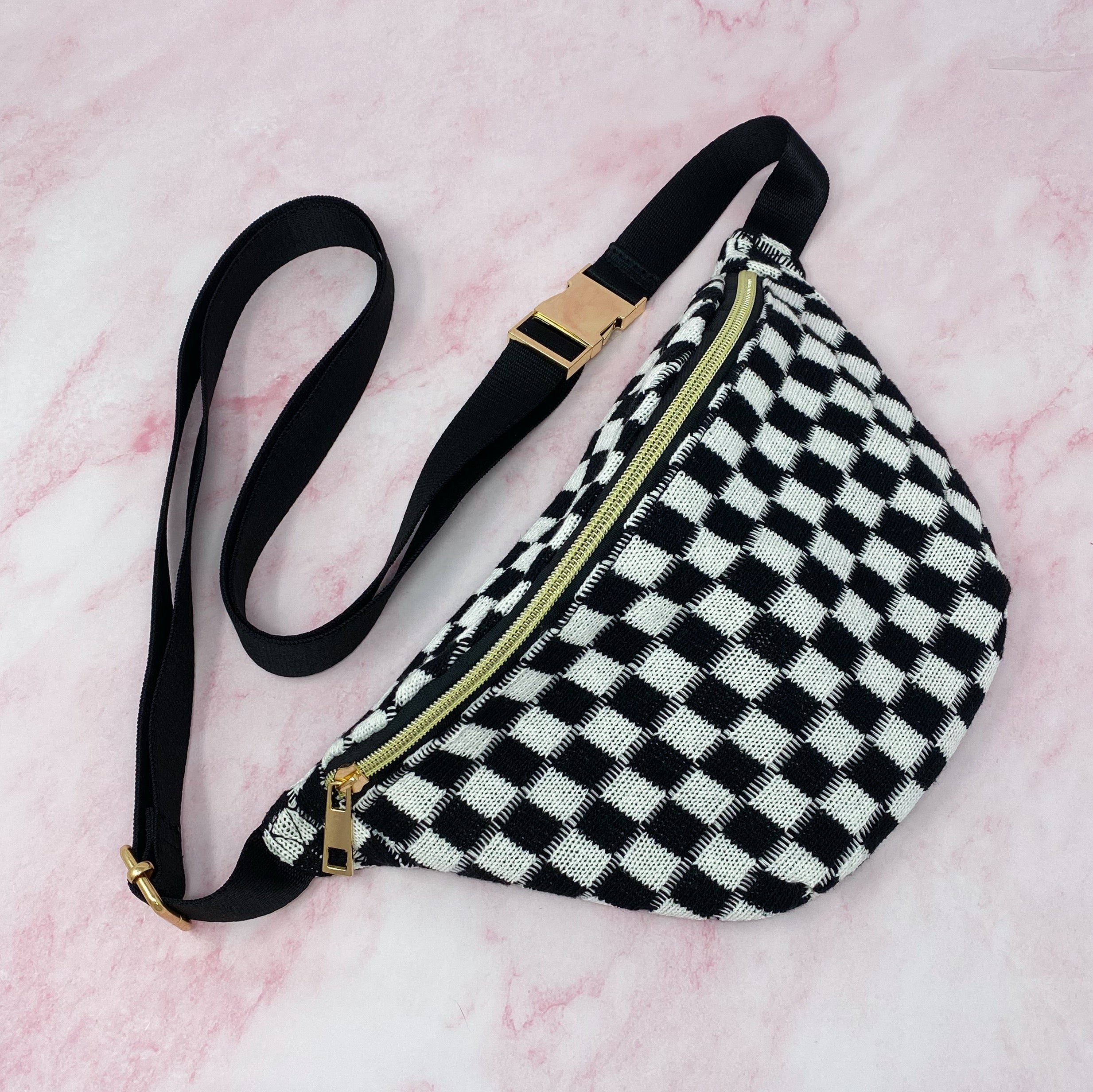 Check Yourself Belt Sling Bag featuring checkered knit material and gold-tone hardware, adjustable strap for comfort.