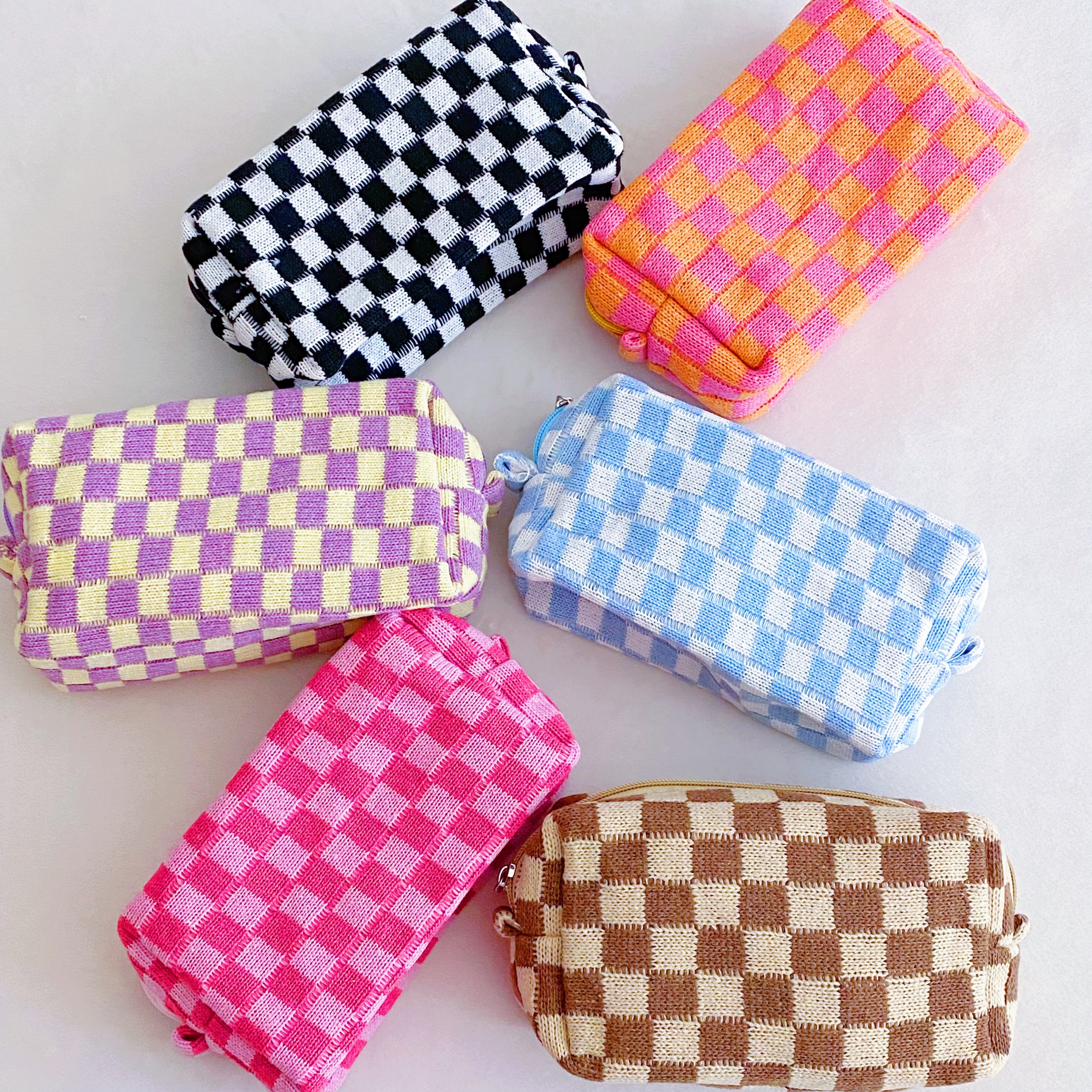 Check Yourself Cosmetic Bag with a stylish checkered pattern and light vinyl lining, perfect for organizing beauty essentials.