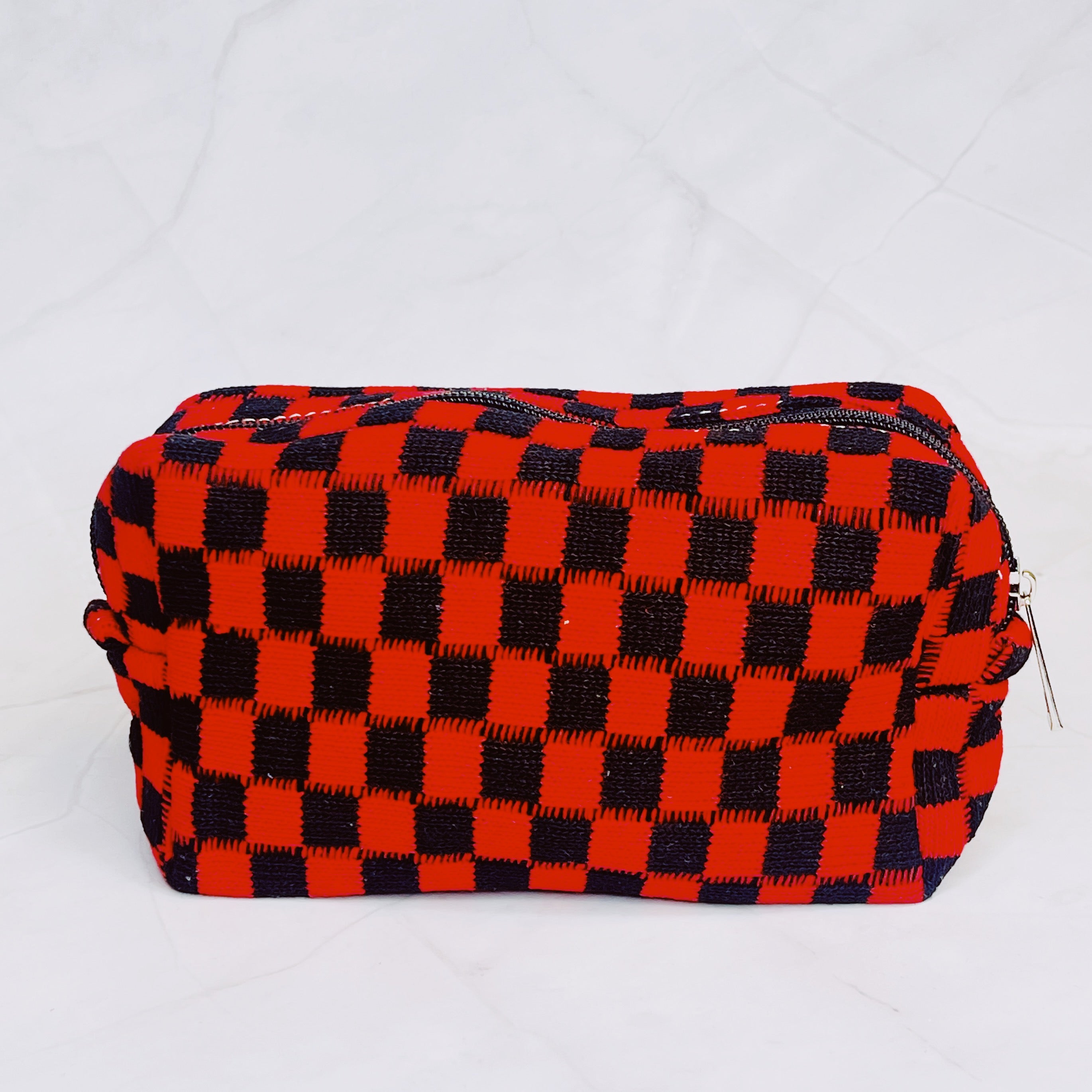 Check Yourself Cosmetic Bag with a stylish checkered pattern and light vinyl lining, perfect for organizing beauty essentials.