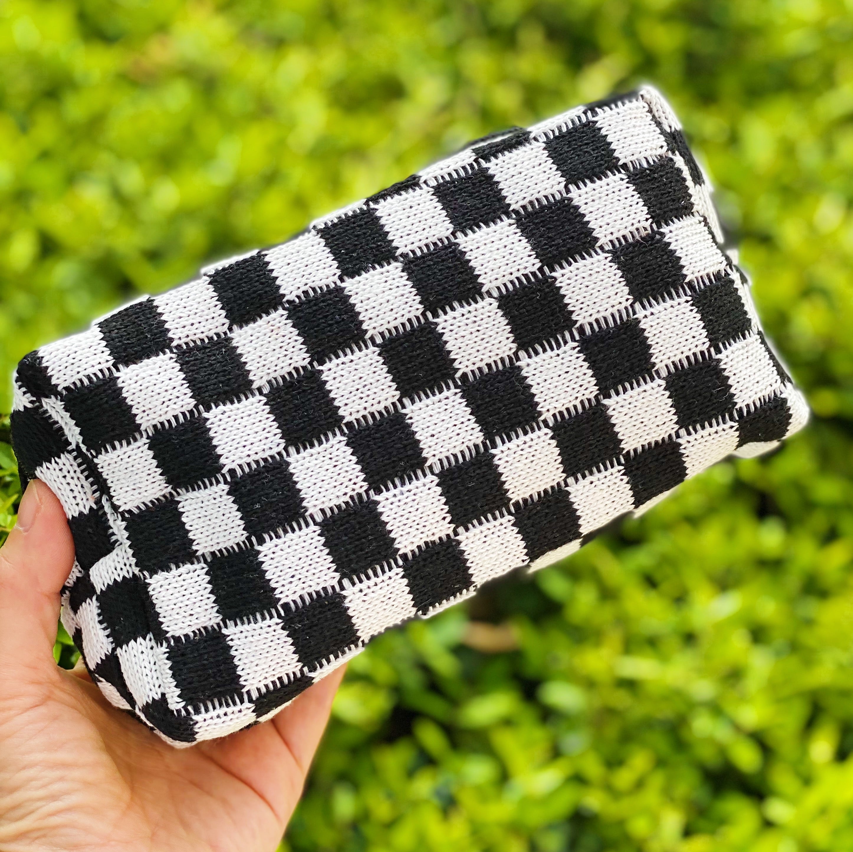 Check Yourself Cosmetic Bag with a stylish checkered pattern and light vinyl lining, perfect for organizing beauty essentials.