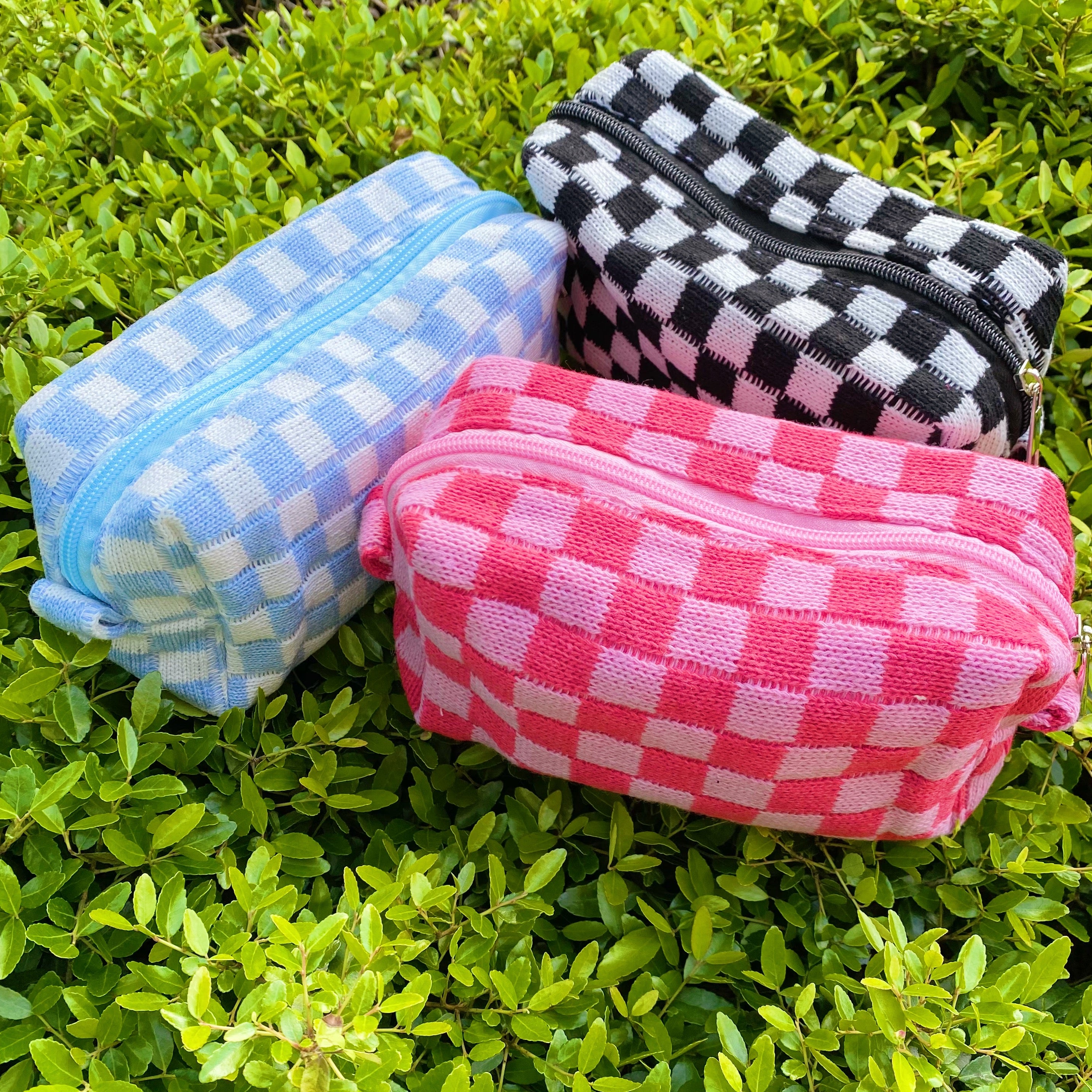 Check Yourself Cosmetic Bag with a stylish checkered pattern and light vinyl lining, perfect for organizing beauty essentials.