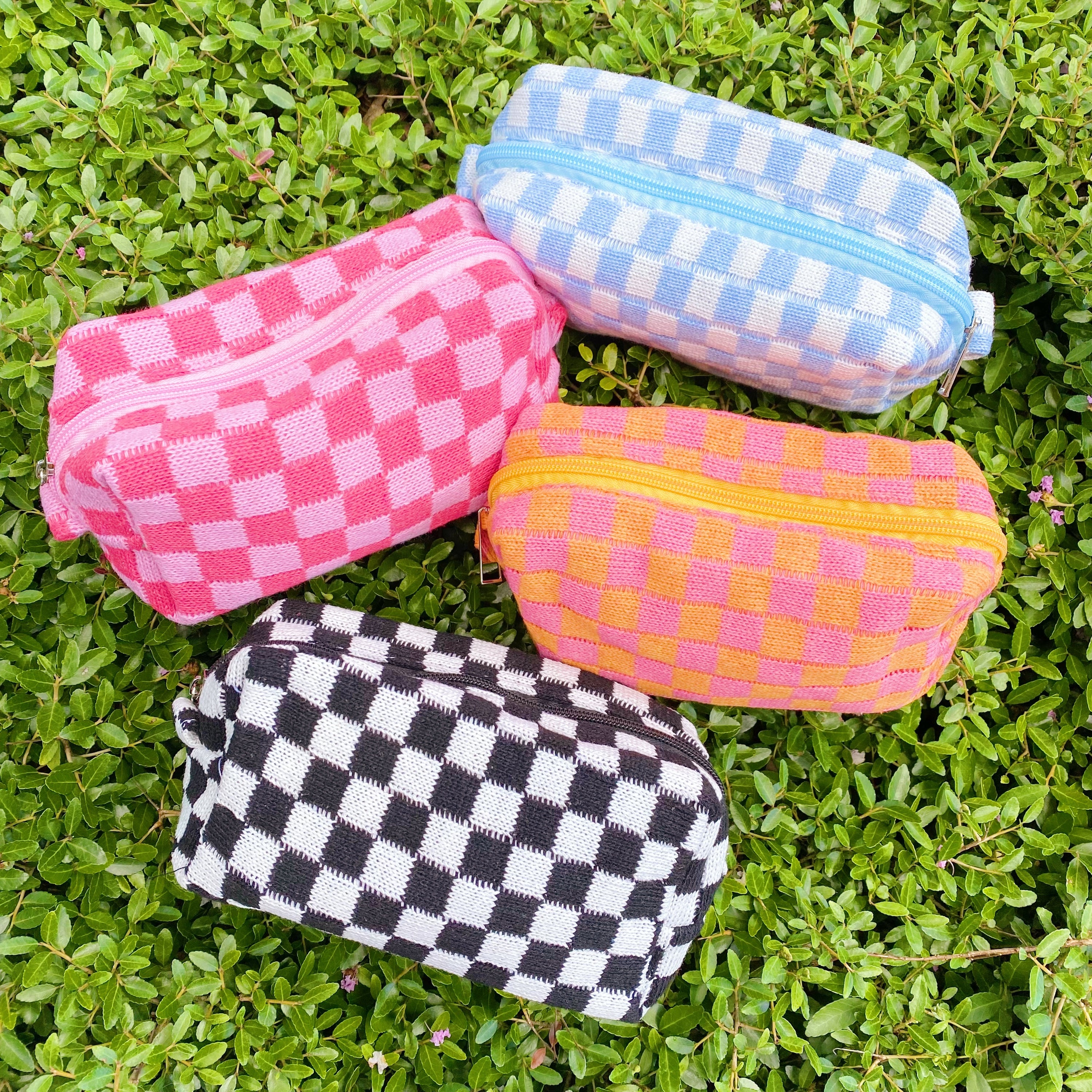 Check Yourself Cosmetic Bag with a stylish checkered pattern and light vinyl lining, perfect for organizing beauty essentials.