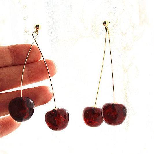 Dark red cherry shape statement earrings with gold plated bronze ear wires, beautifully designed for a stylish look.