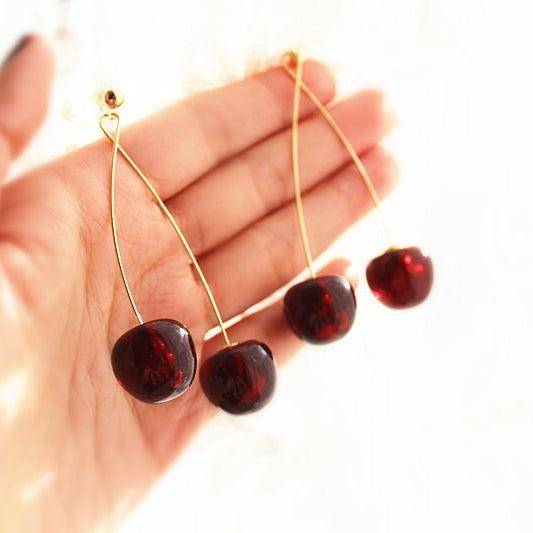 Dark red cherry shape statement earrings with gold plated bronze ear wires, beautifully designed for a stylish look.