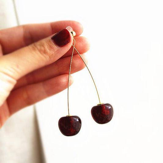 Dark red cherry shape statement earrings with gold plated bronze ear wires, beautifully designed for a stylish look.