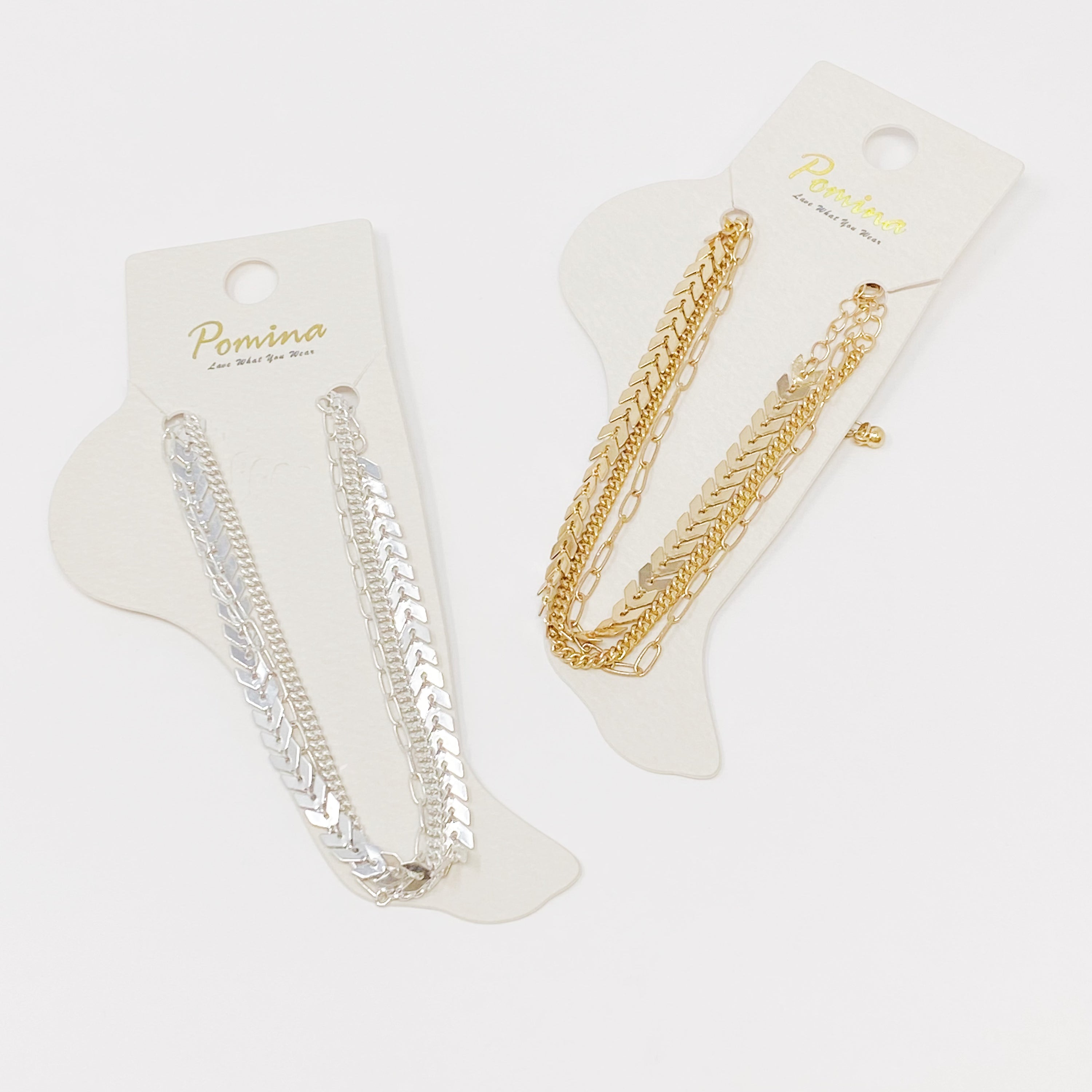 Set of 3 Chevron Chain Anklets in gold and silver plating, showcasing trendy layered design.