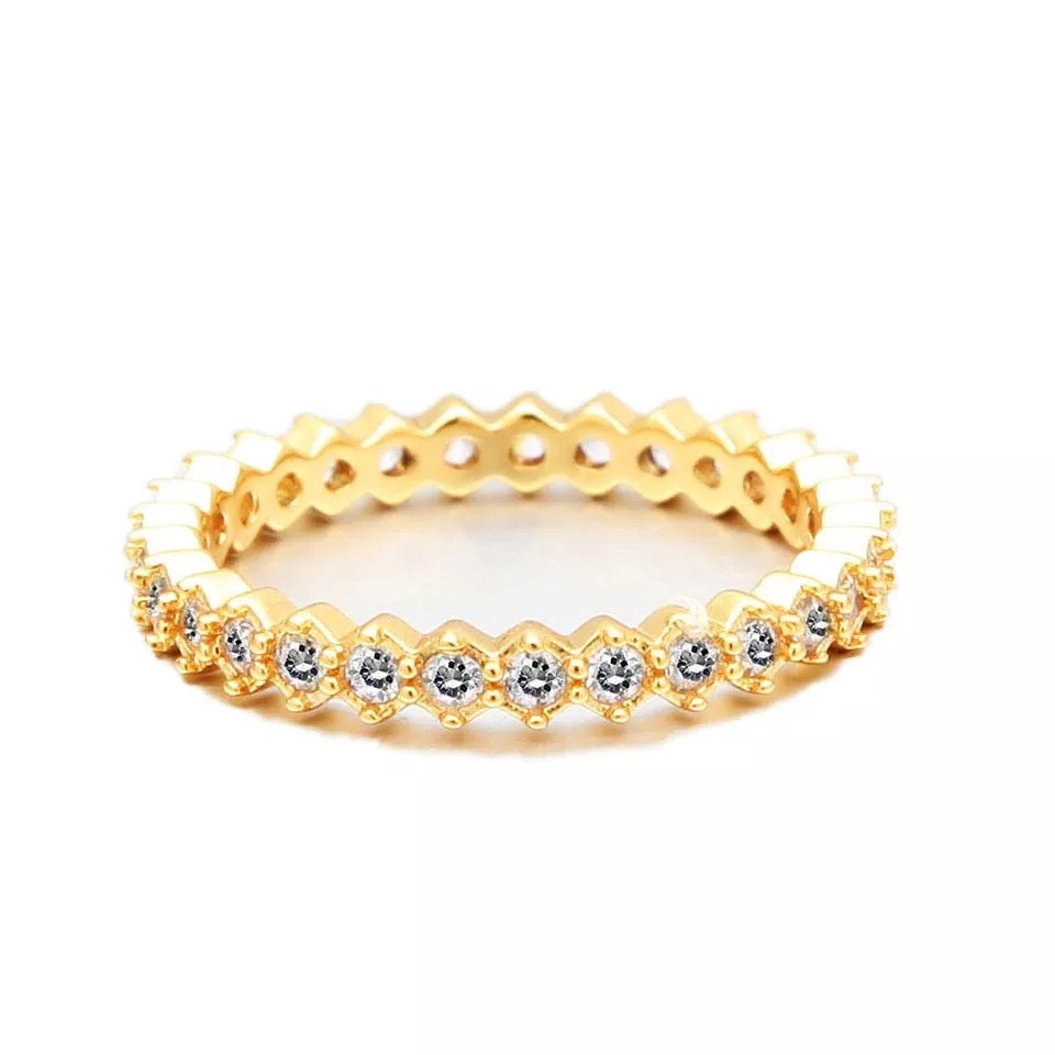 Christine CZ Band Ring featuring sparkling cubic zirconia stones on a 14k plated sterling silver band, available in sizes 6, 7, and 8.