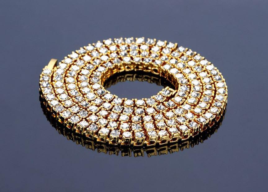 CHRYSALIS Bling Master Chain featuring rhinestone studs in gold plating, perfect for stylish occasions.