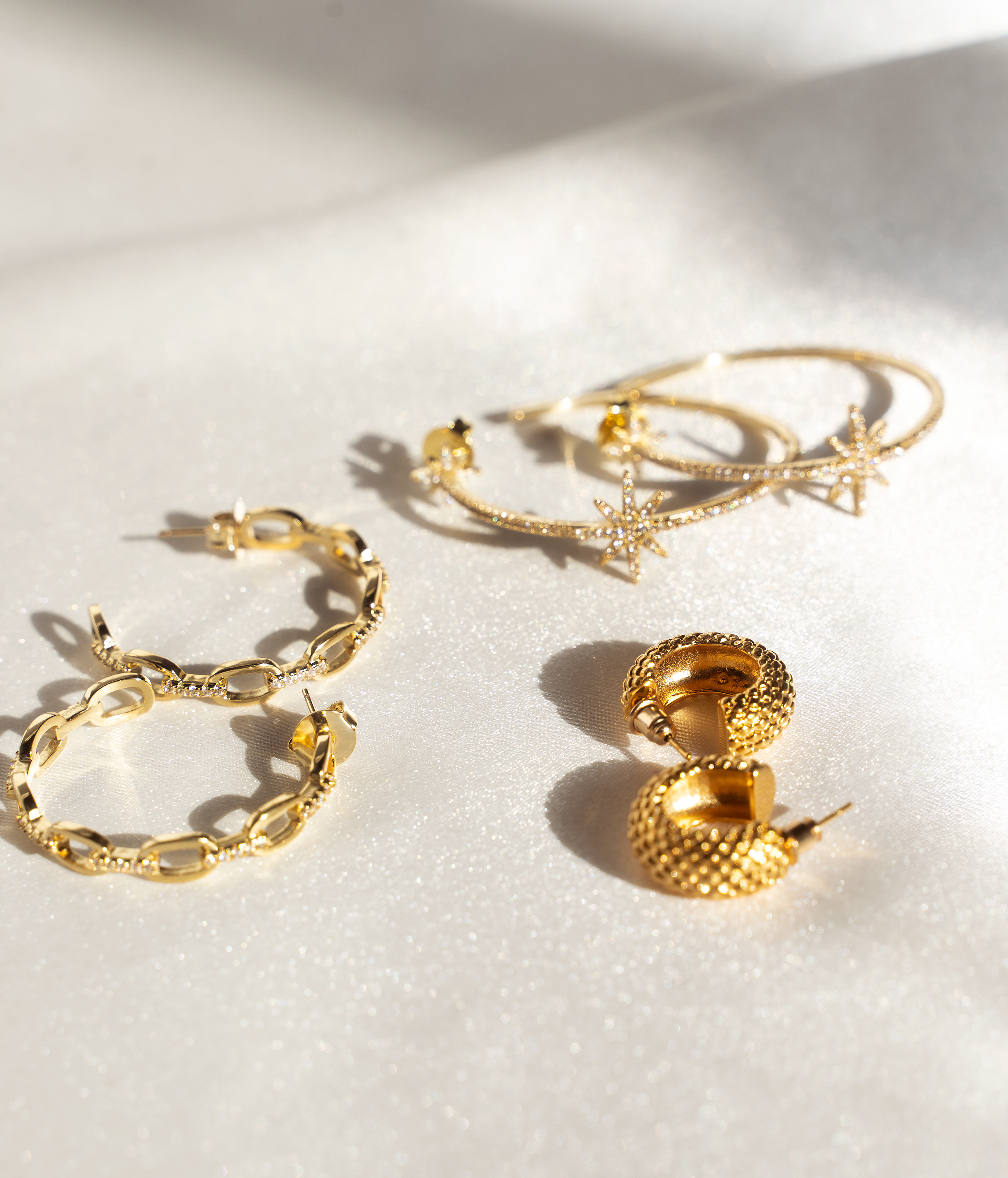 CIARA Hoop Earrings featuring a textured woven basket pattern in luxurious 14K gold plating.