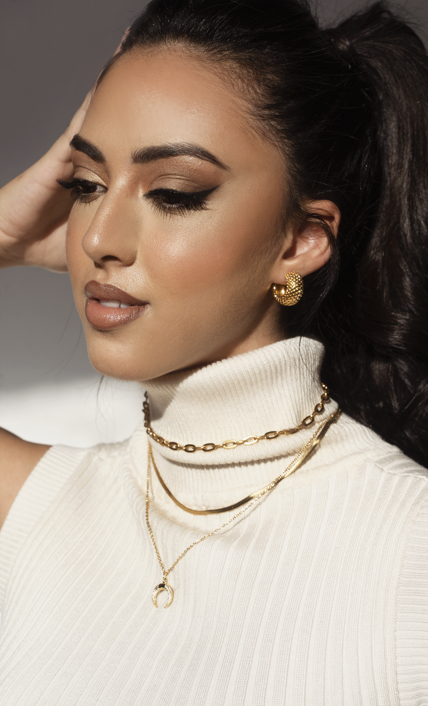 CIARA Hoop Earrings featuring a textured woven basket pattern in luxurious 14K gold plating.